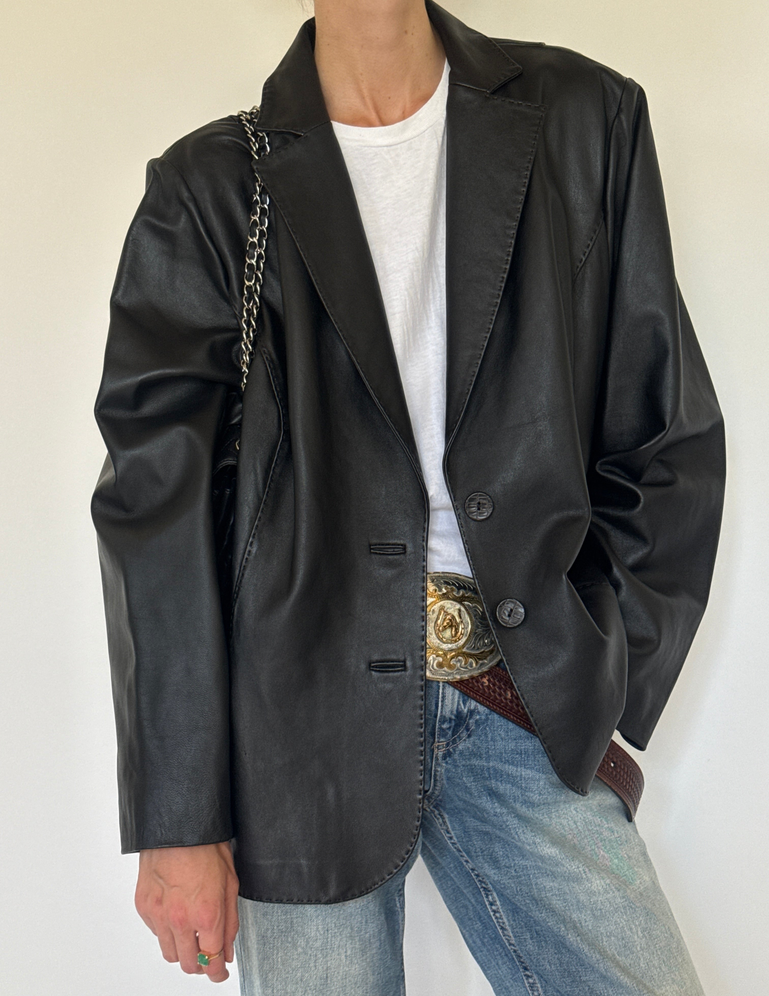 Vintage black leather and topstitching close-up