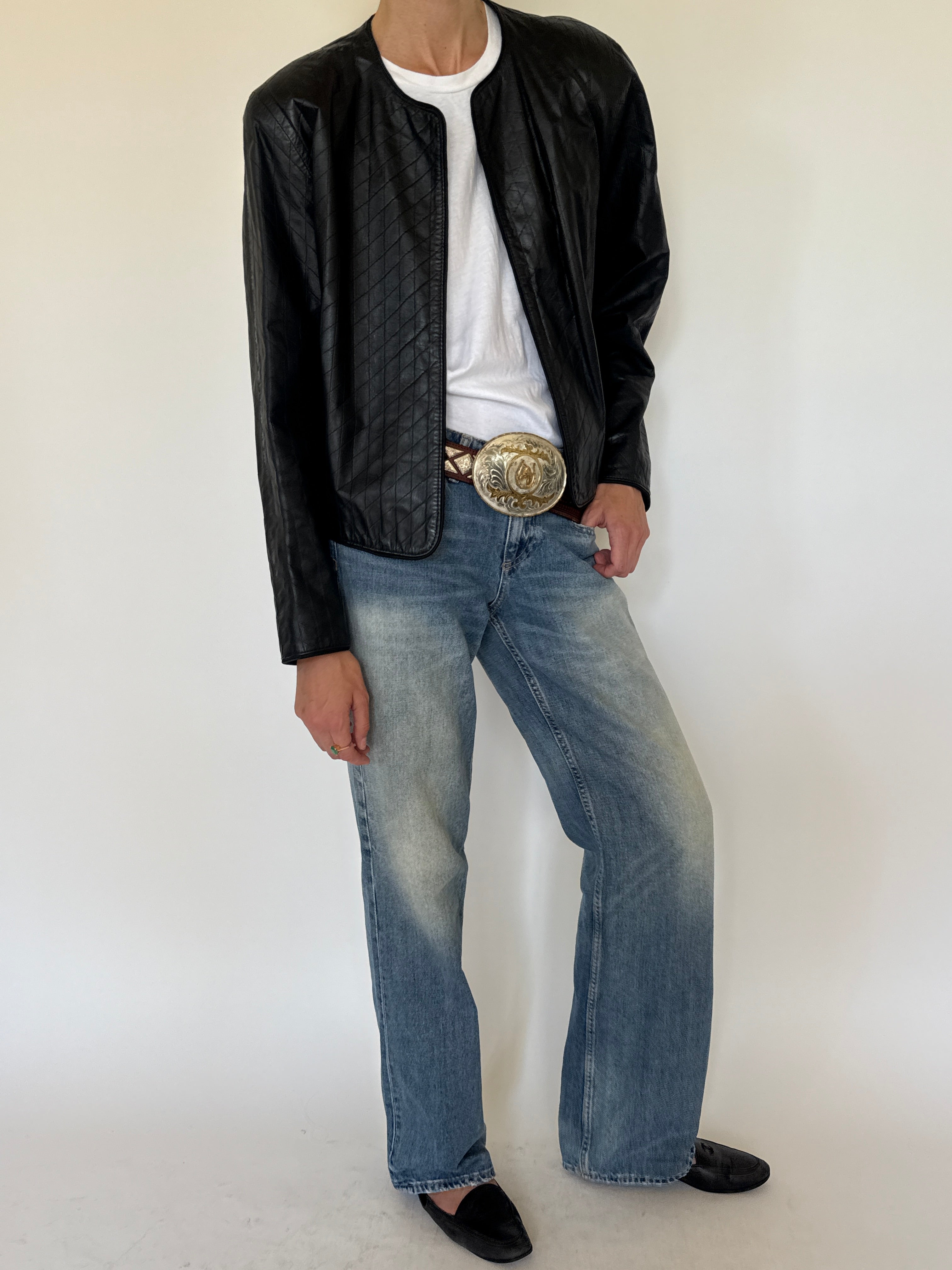 Vintage black quilted leather jacket front view