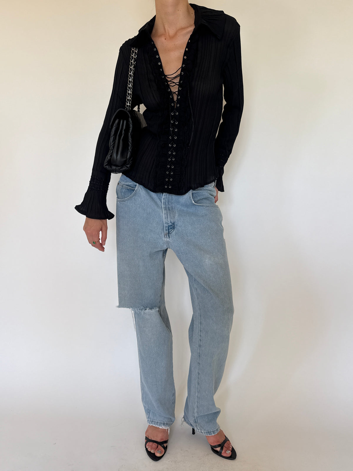 Vintage black lace-up blouse front view