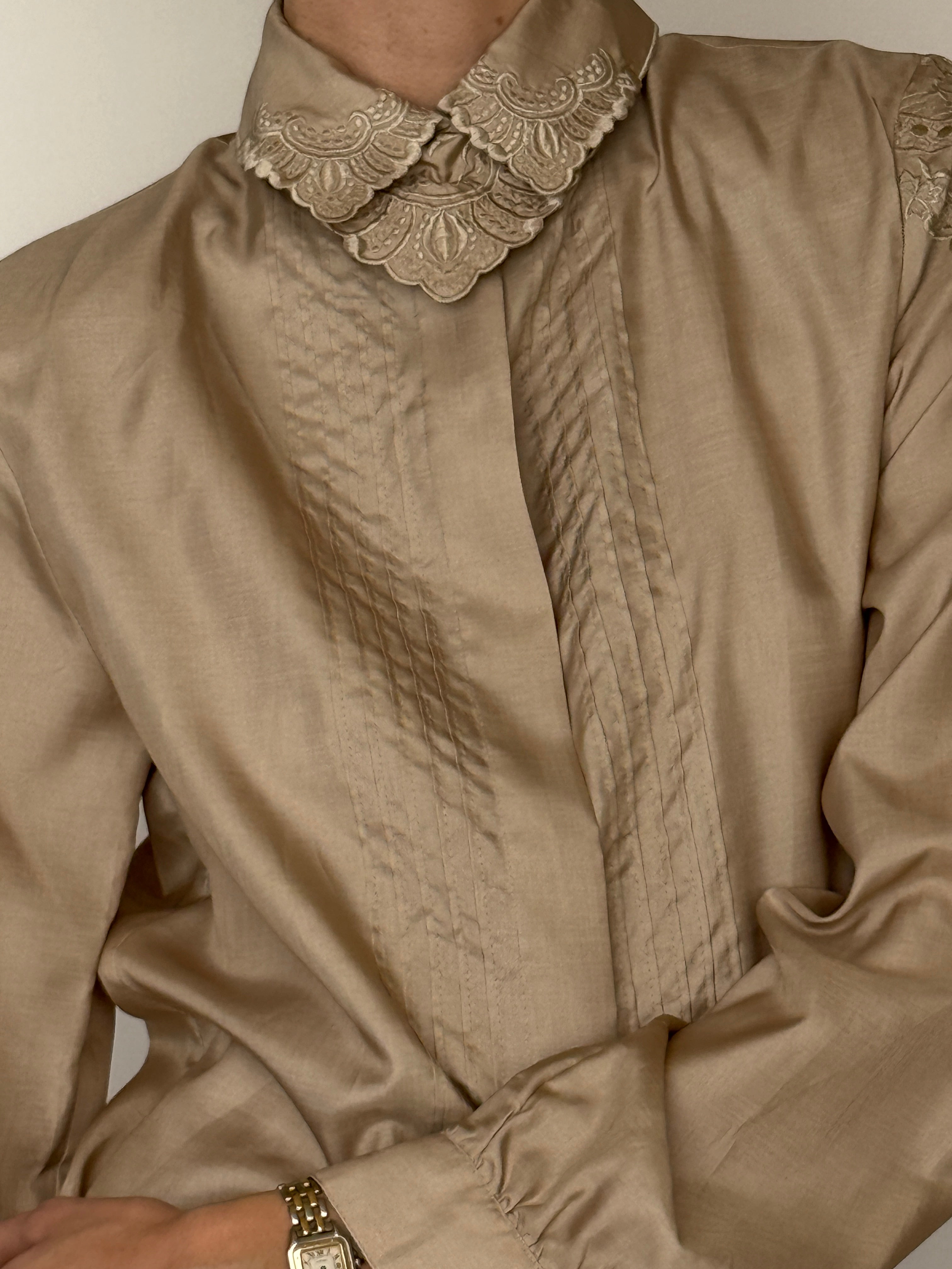 Vintage champagne embroidered collar blouse fabric close-up subtle sheen texture