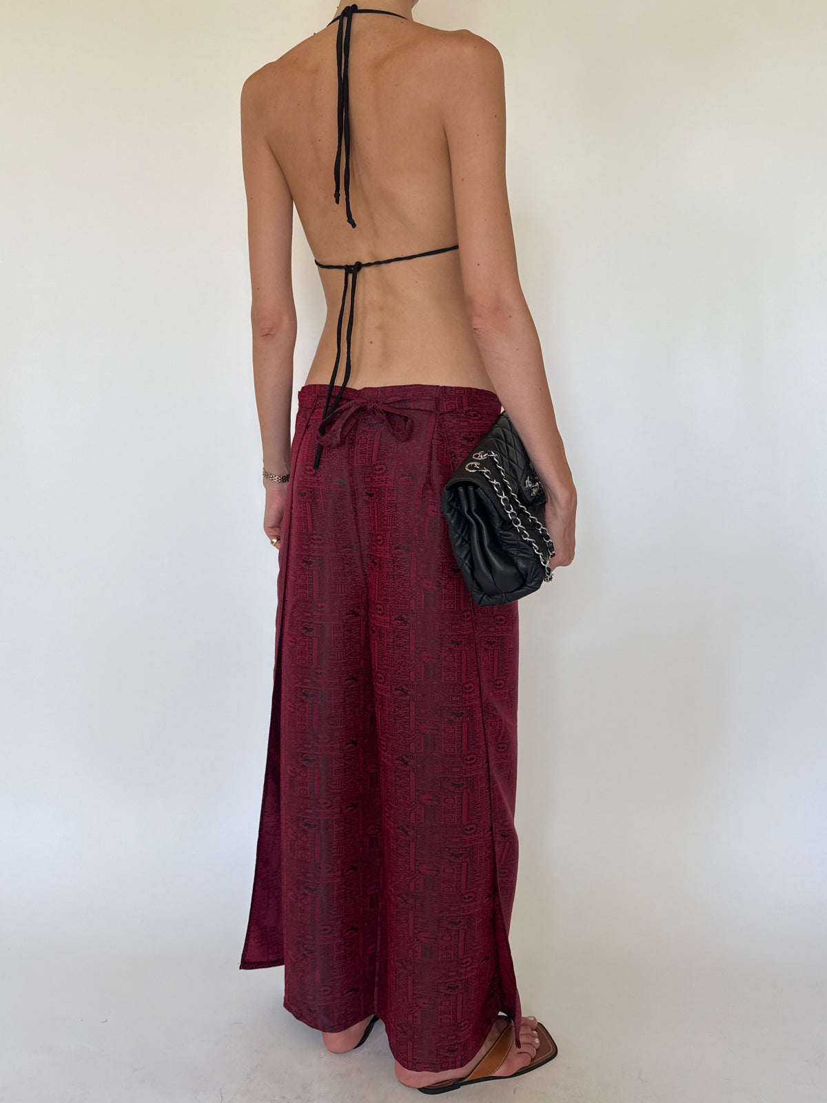 Vintage burgundy printed pants back view