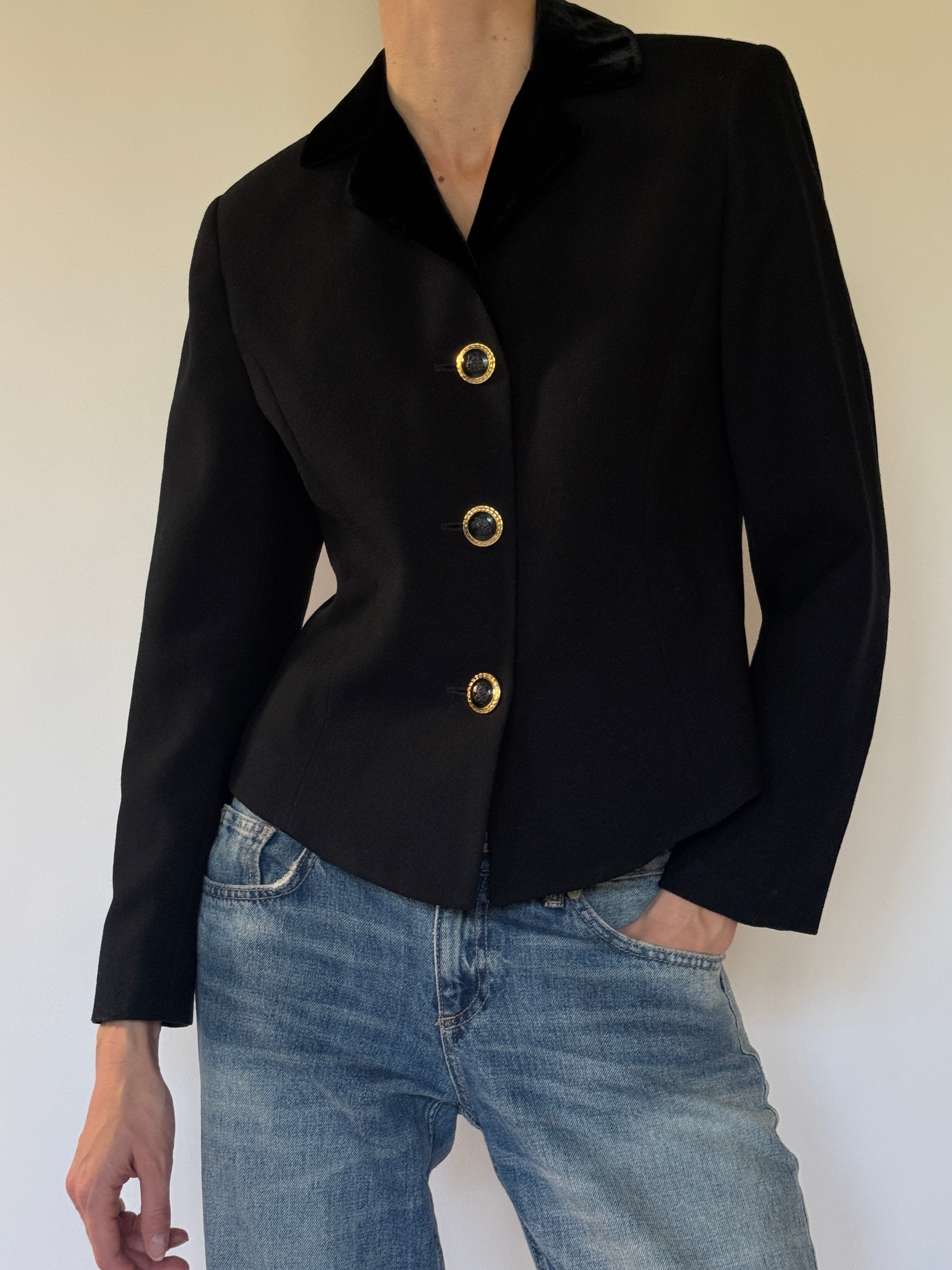 Vintage black blazer fabric close-up