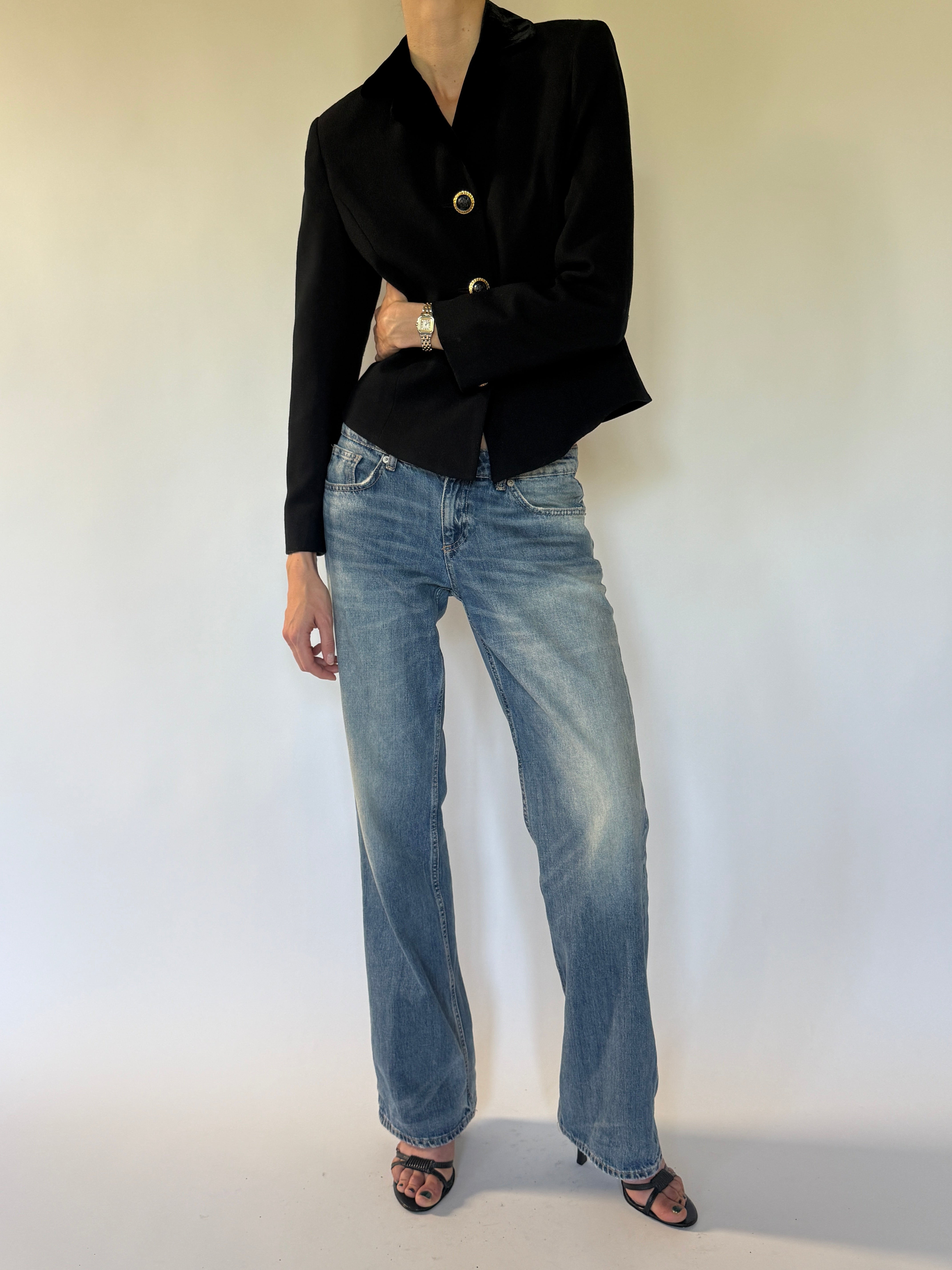 Vintage black blazer angled full-length view with gold-tone buttons