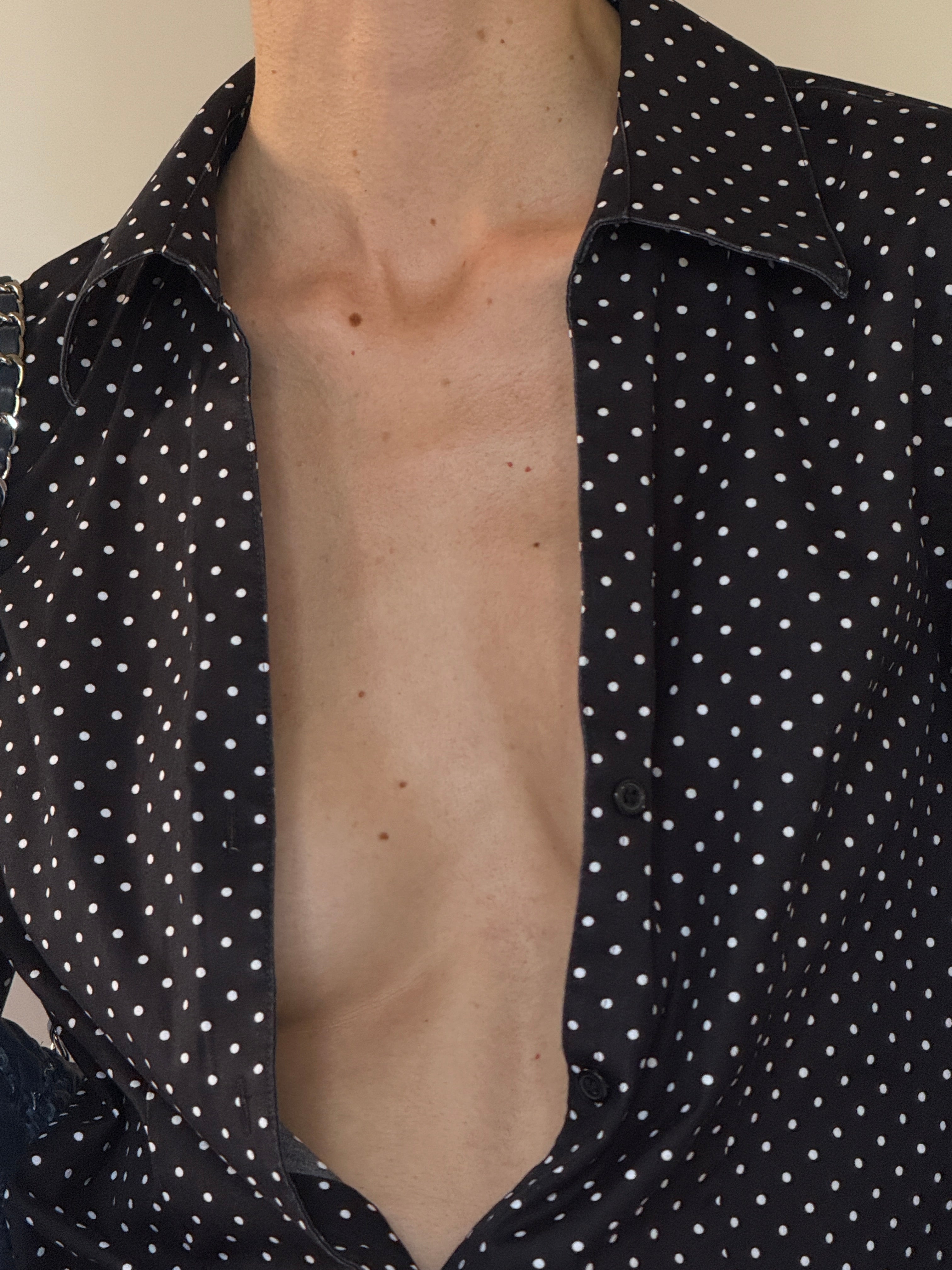 Vintage black and white polka dot fabric close-up