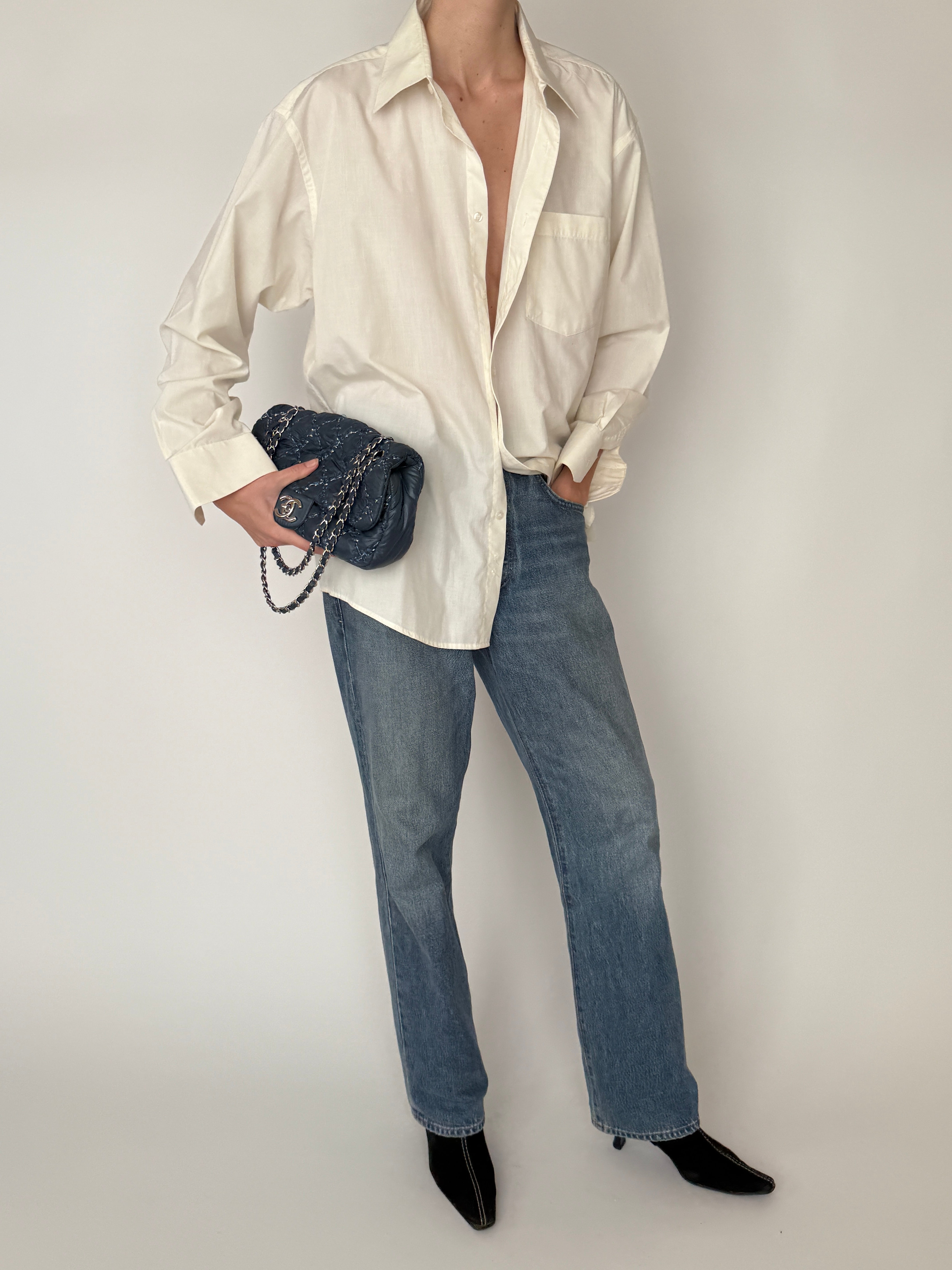 Vintage oversized cream shirt angled front view