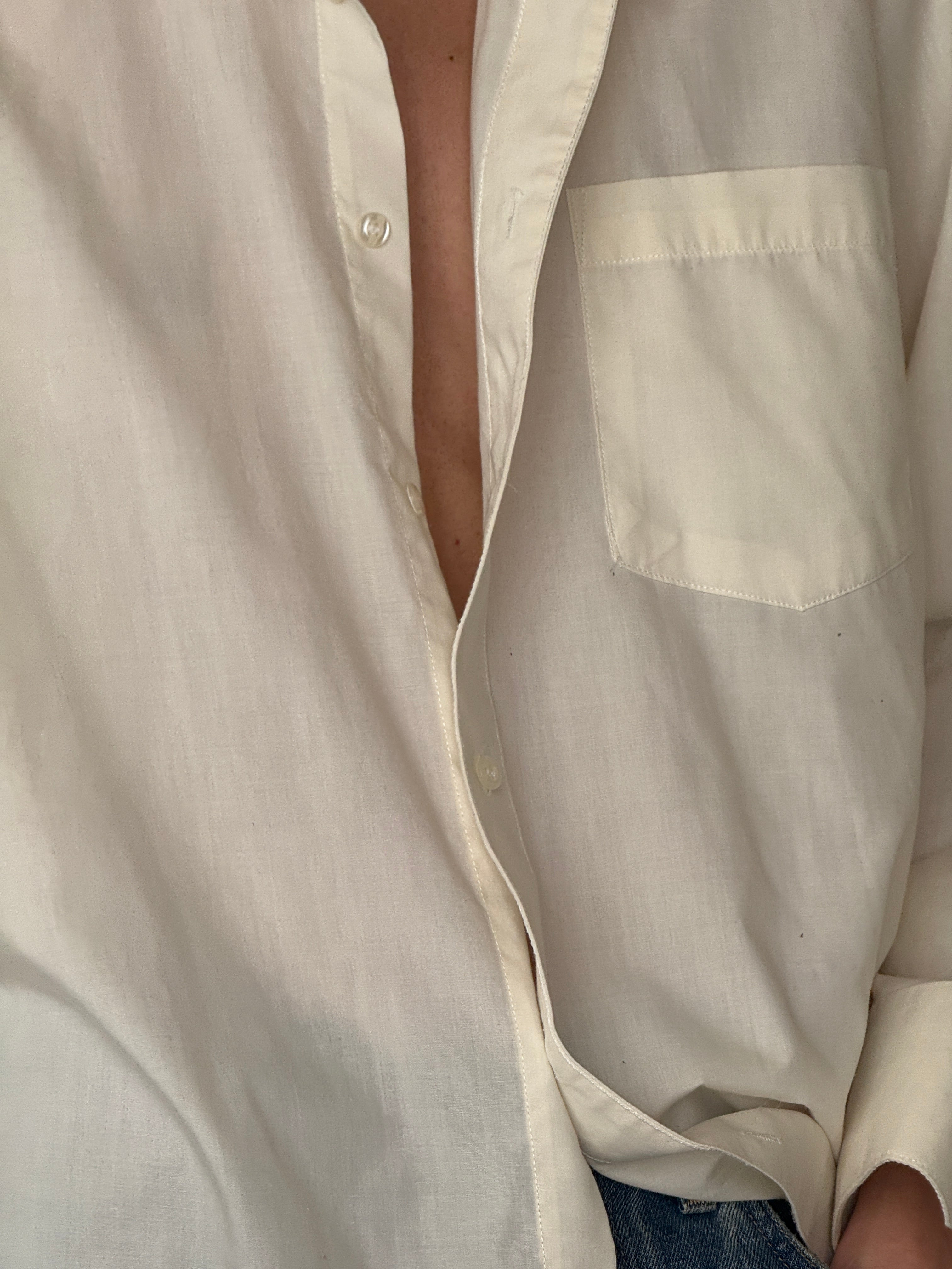 Vintage cream shirt fabric close-up
