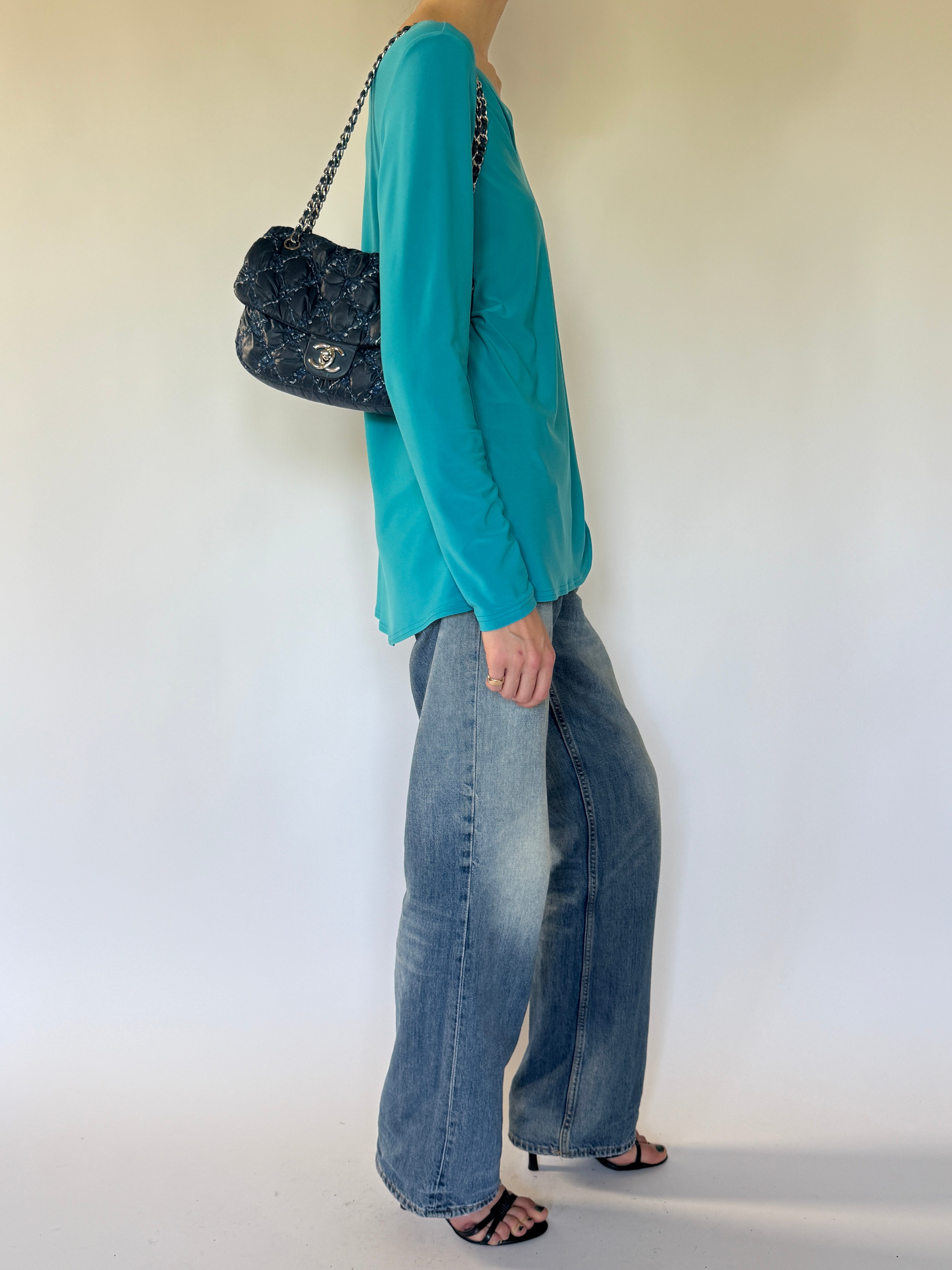 Vintage turquoise long sleeve top side view