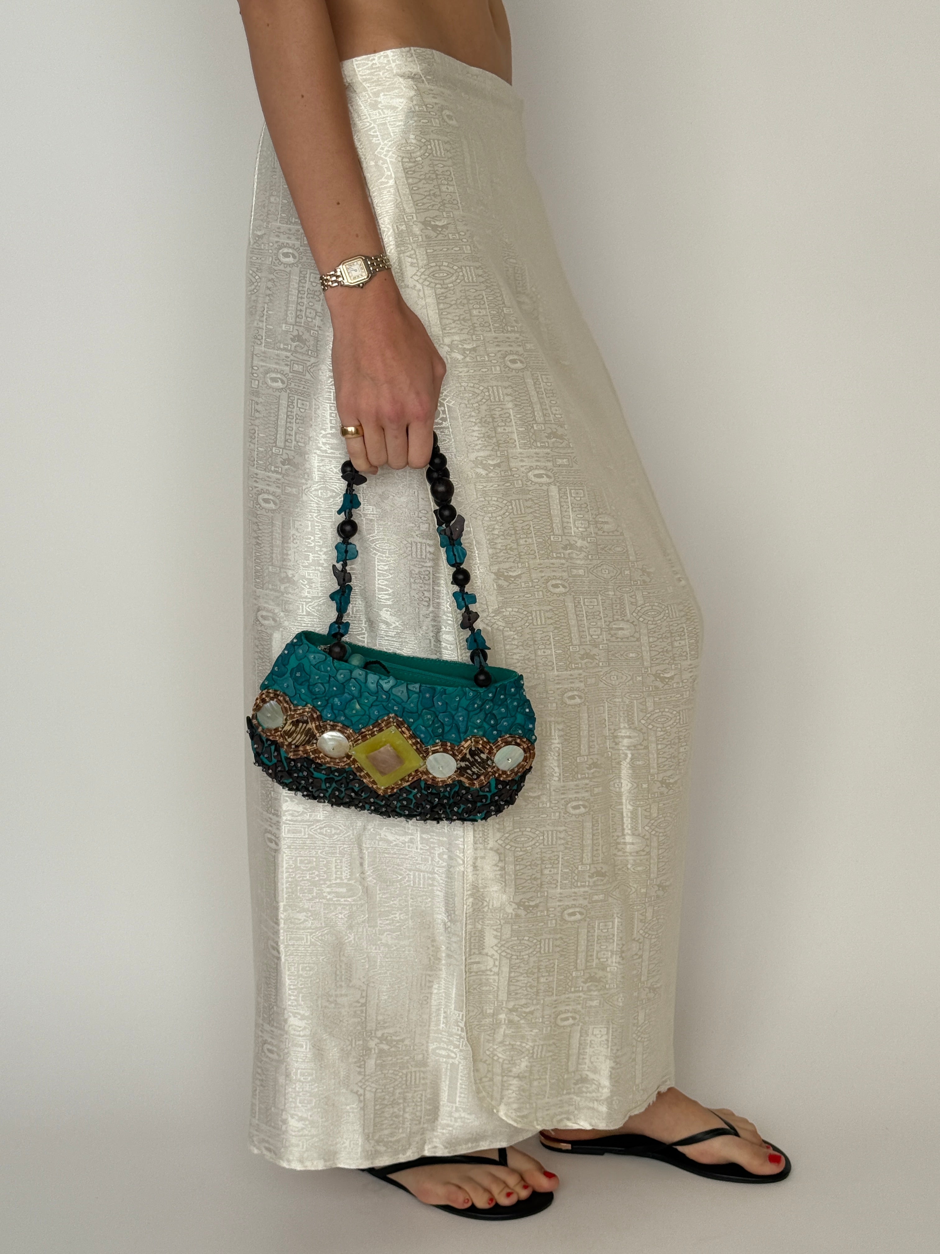 Vintage beaded handbag teal embellished exterior