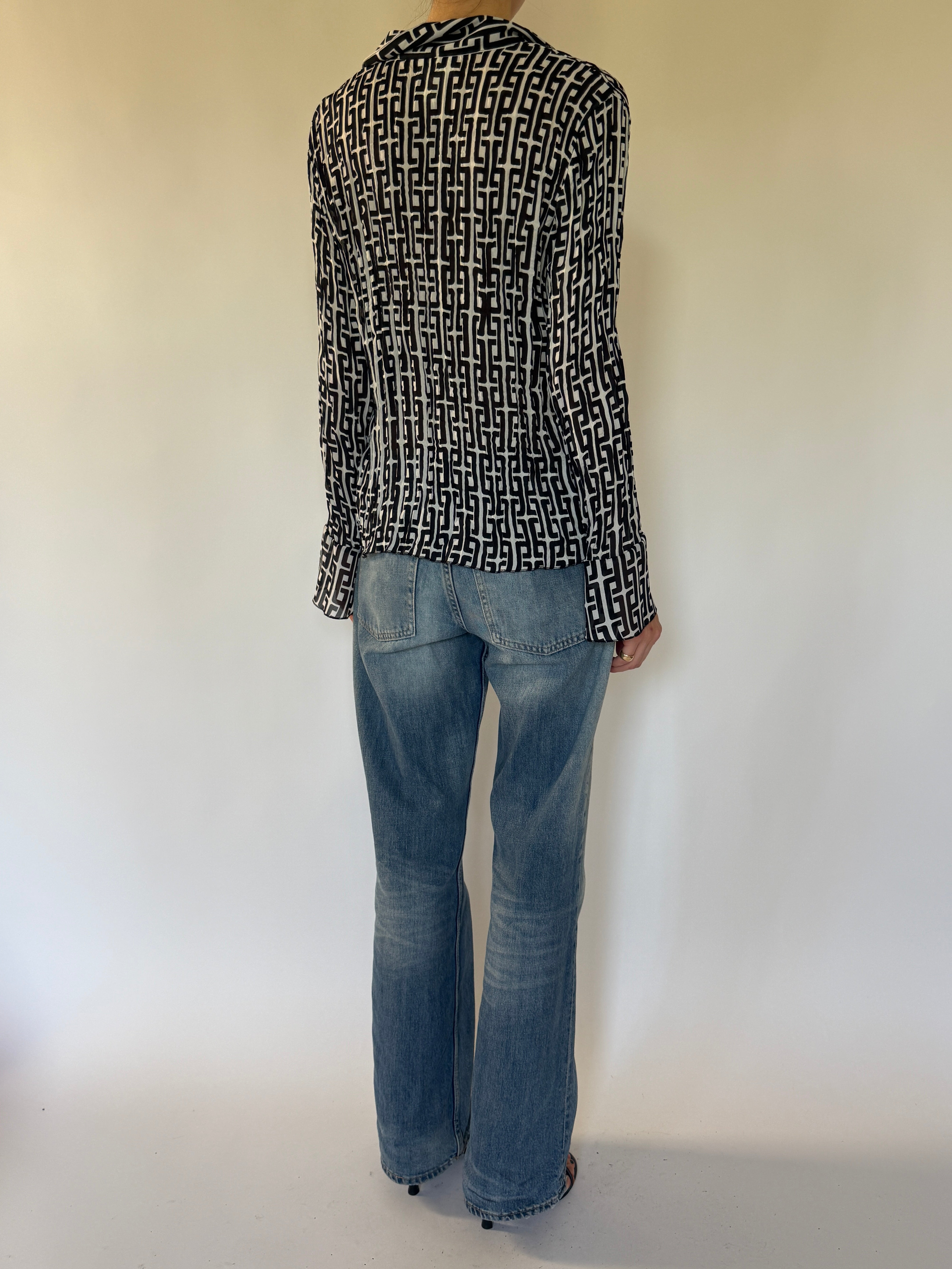 Vintage black and ivory ruffle blouse back view