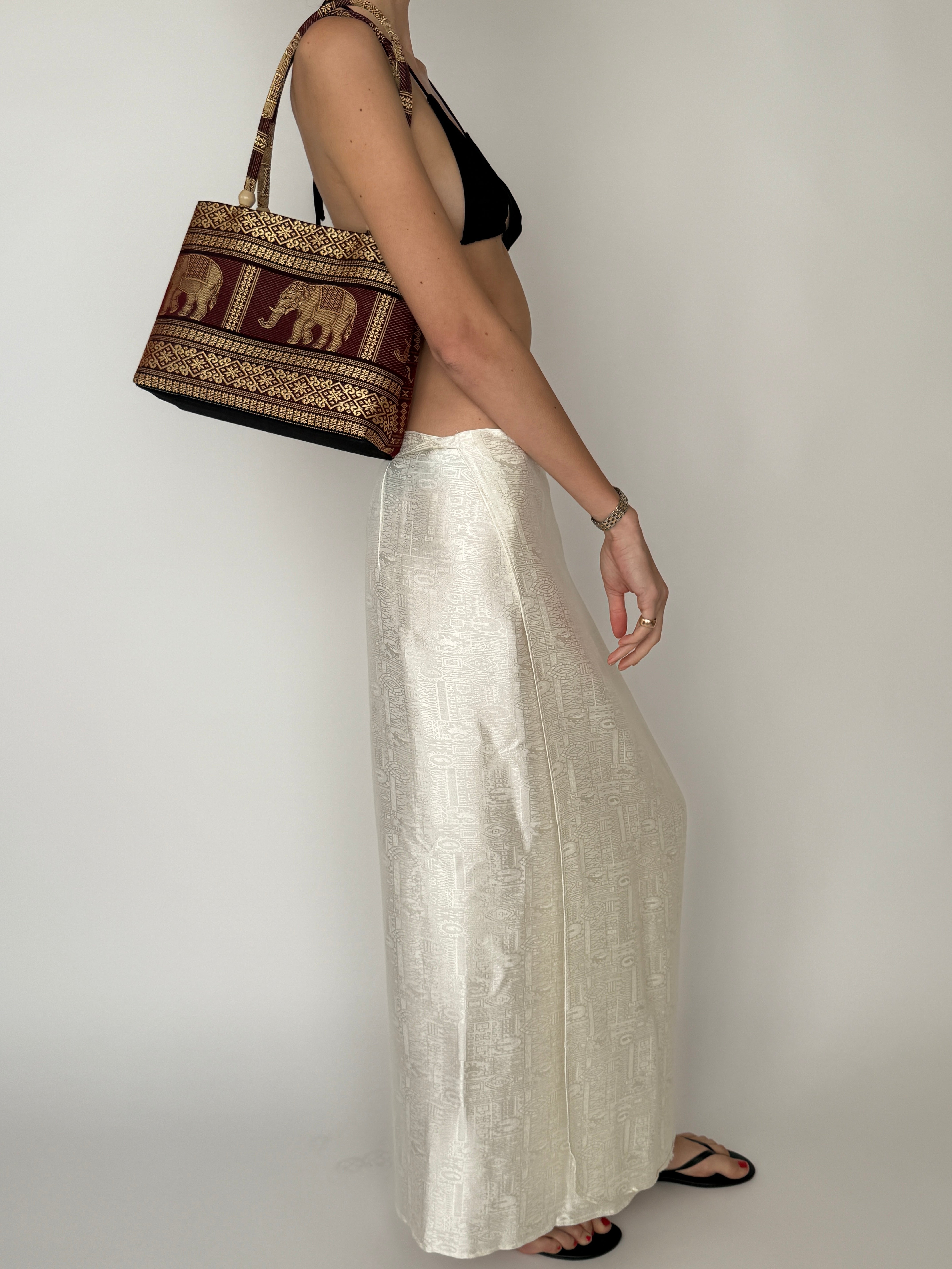Vintage structured elephant print shoulder bag angled view