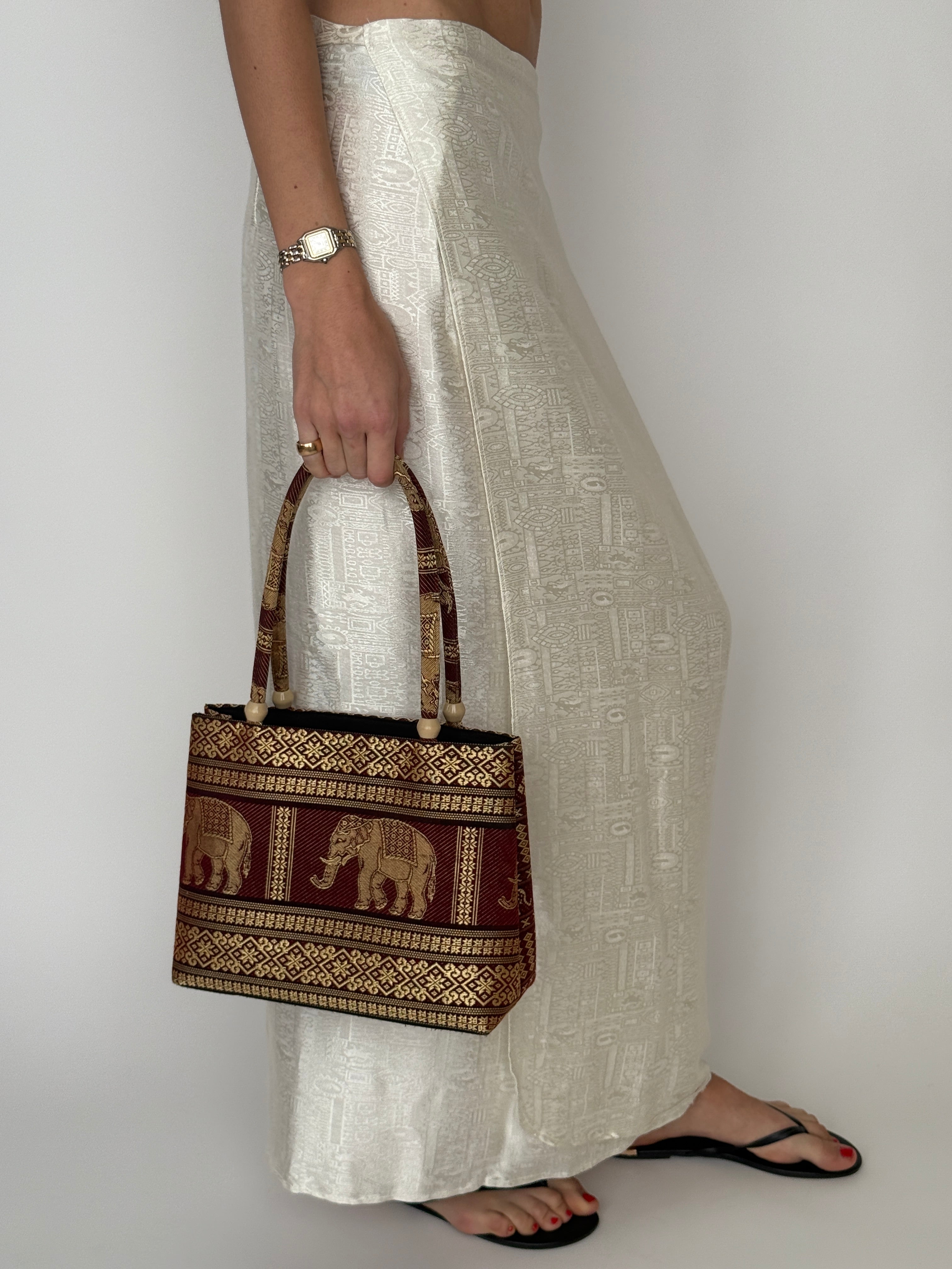 Vintage tapestry shoulder bag handle detail