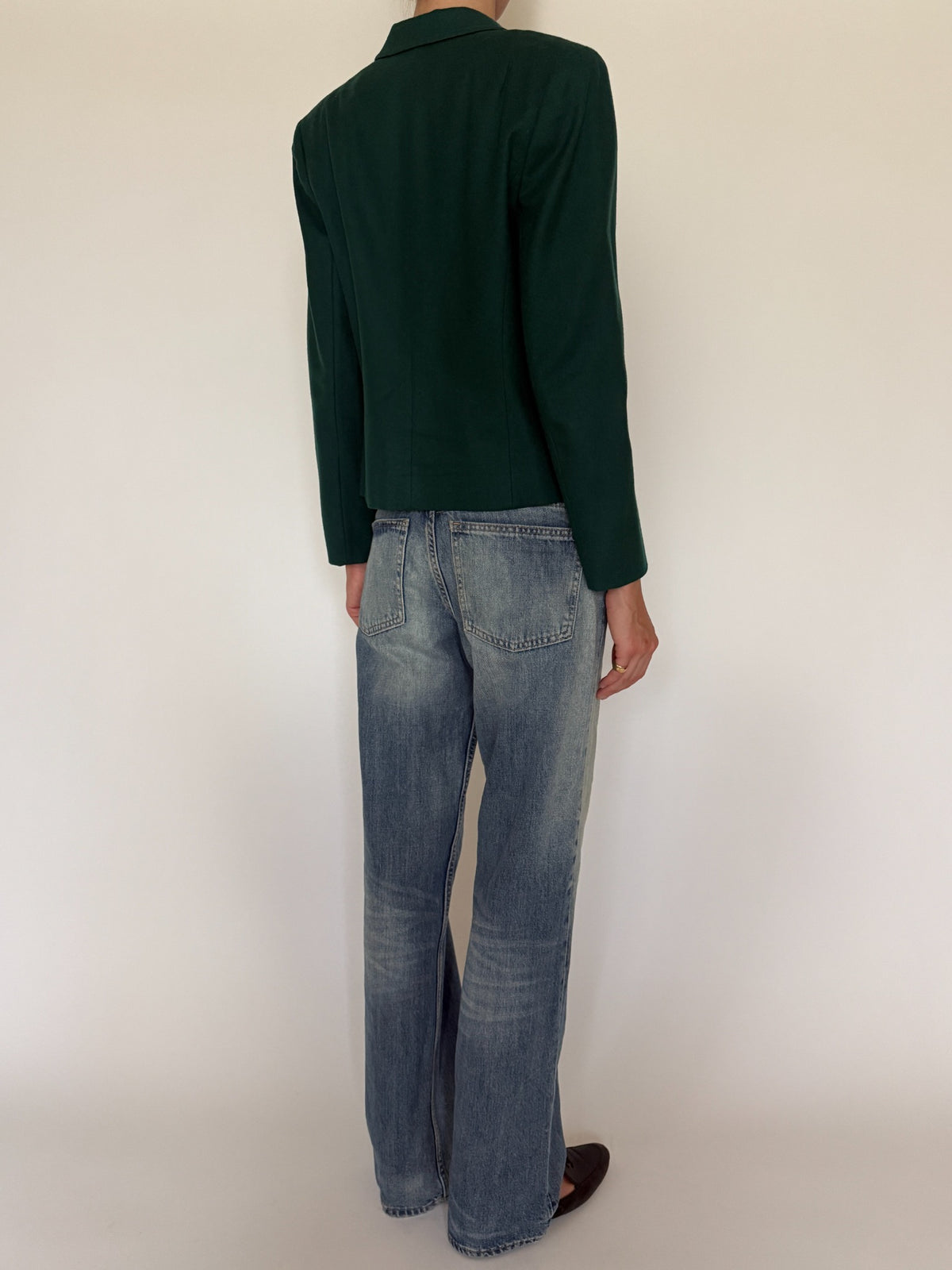 Back view of forest green cropped blazer
