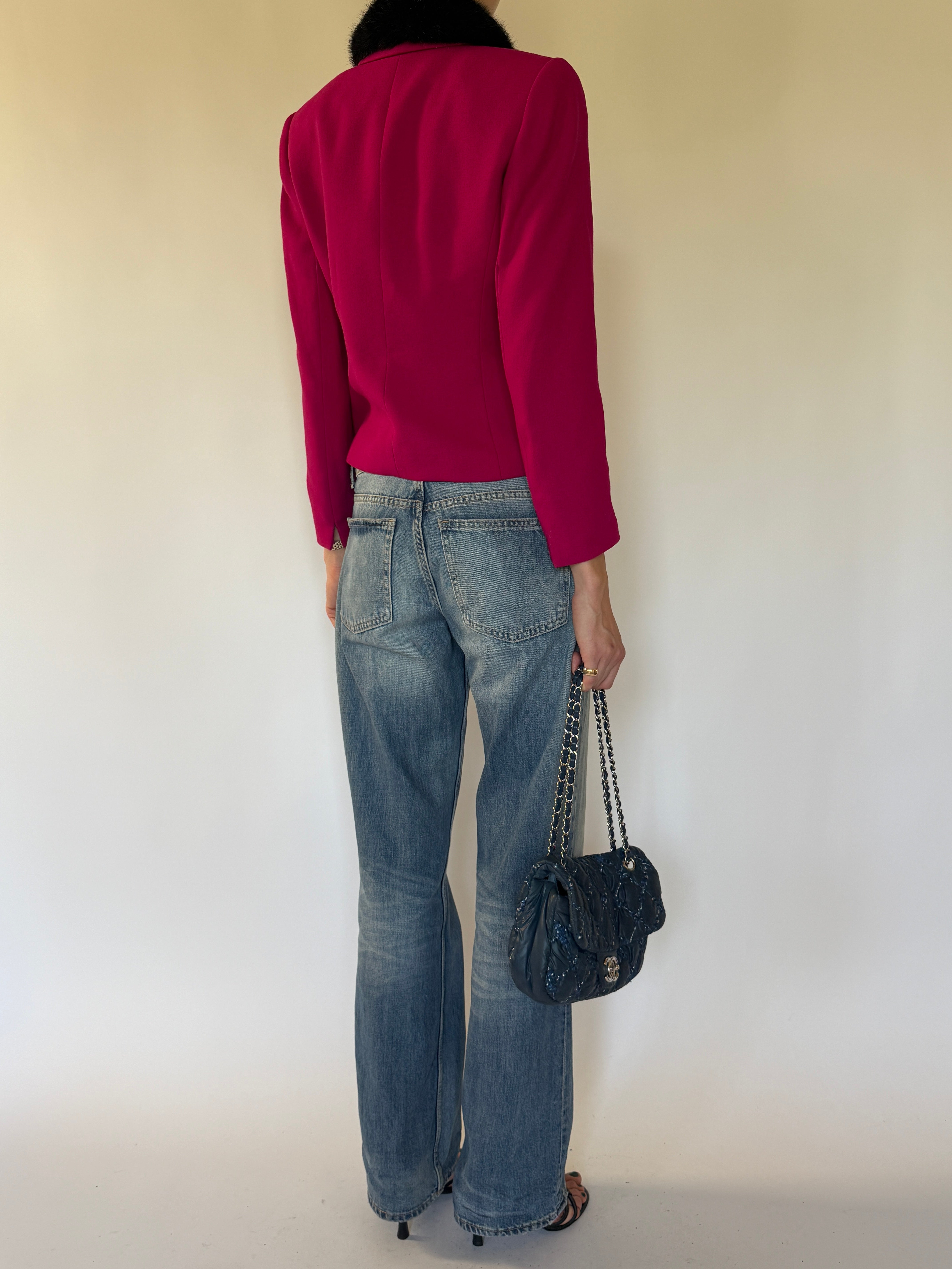 Vintage pink jacket back view with tailored shaping