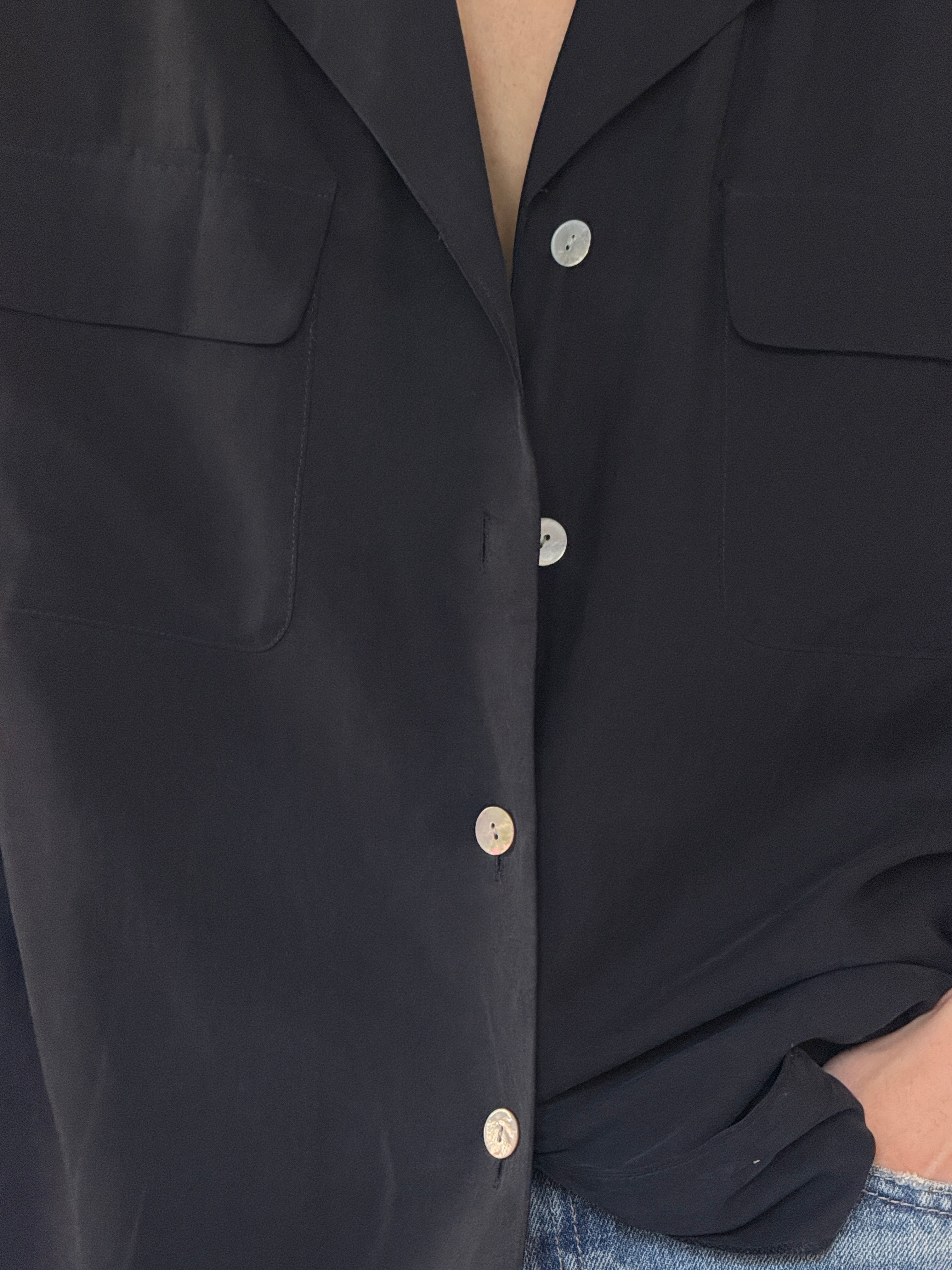 Vintage black silk fabric close-up detail