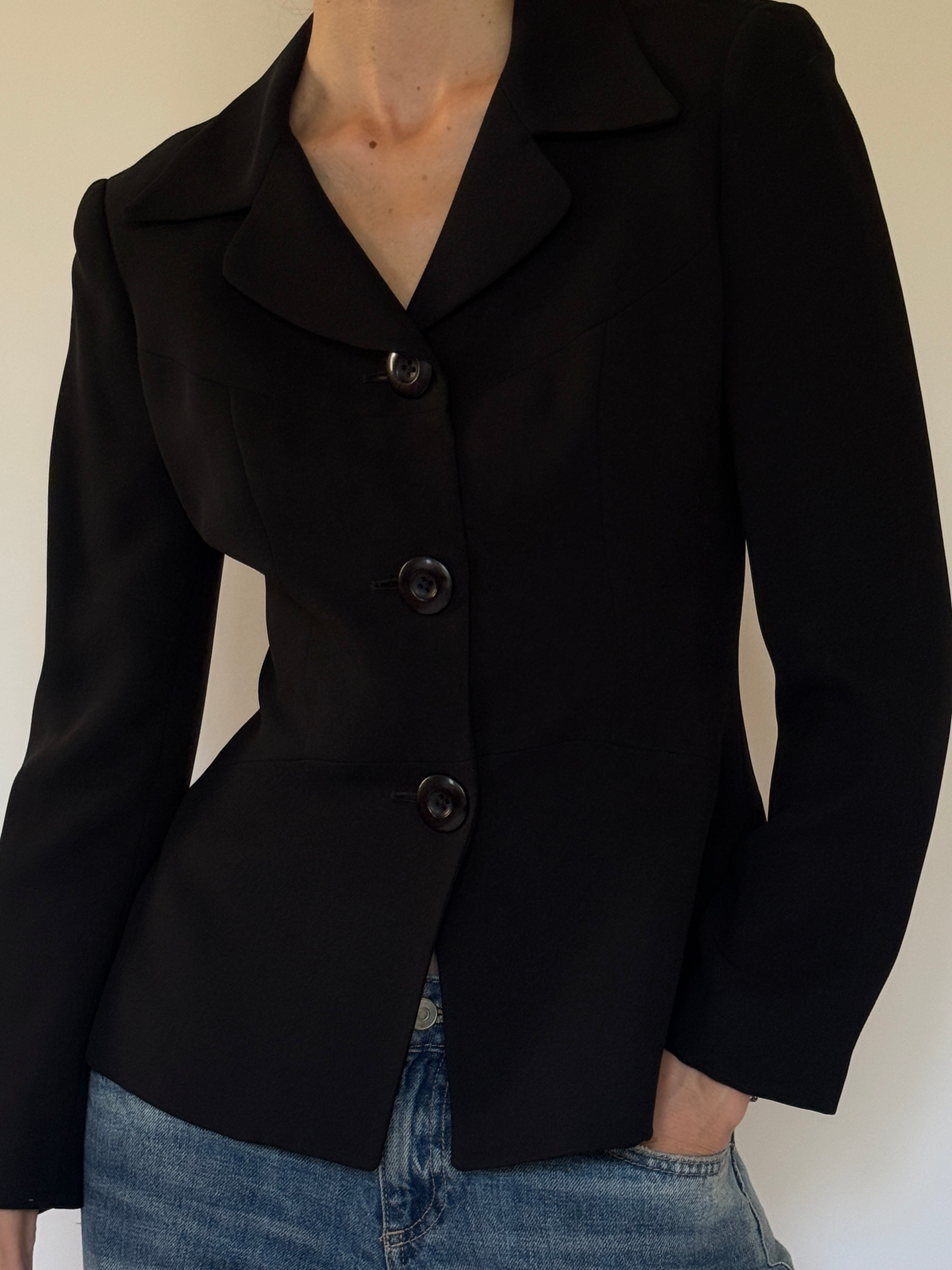 Vintage black blazer fabric close-up