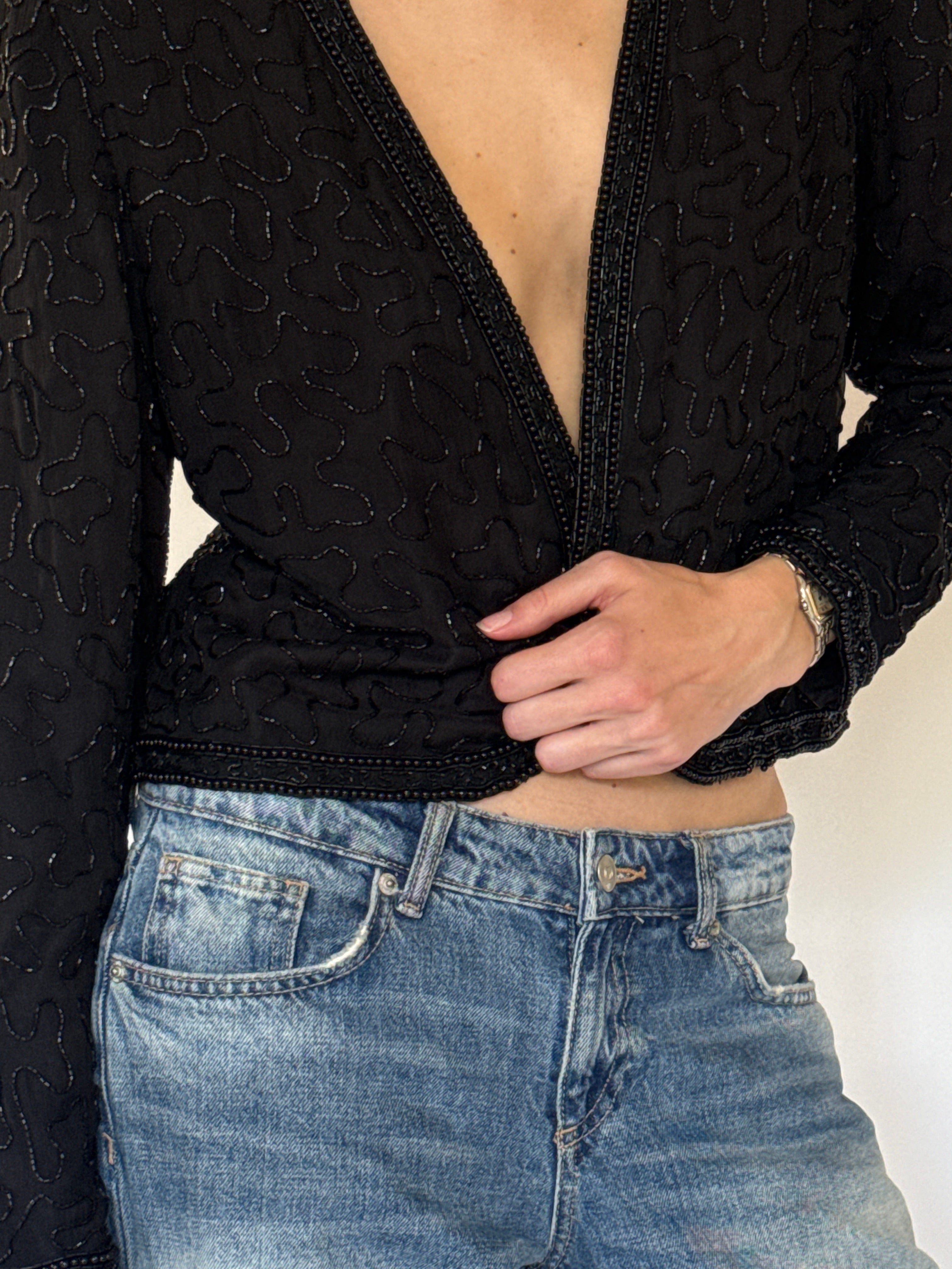 Vintage black tonal beadwork close-up