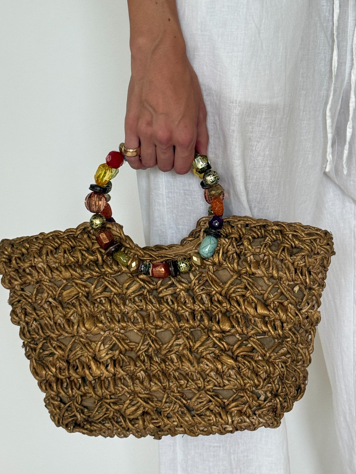 Vintage gold woven handbag with multicolored beaded handles