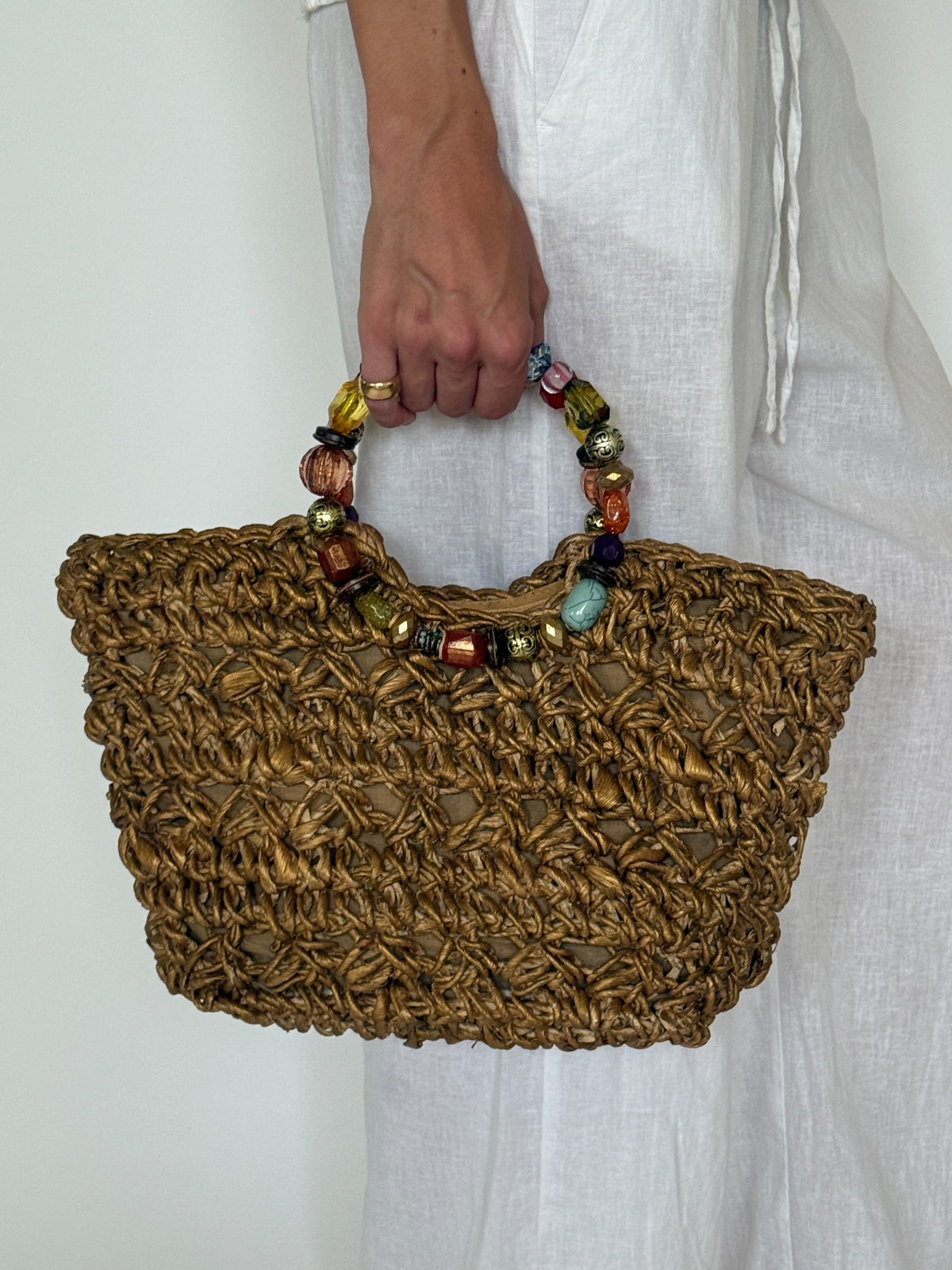 Vintage gold woven handbag with multicolored beaded handles