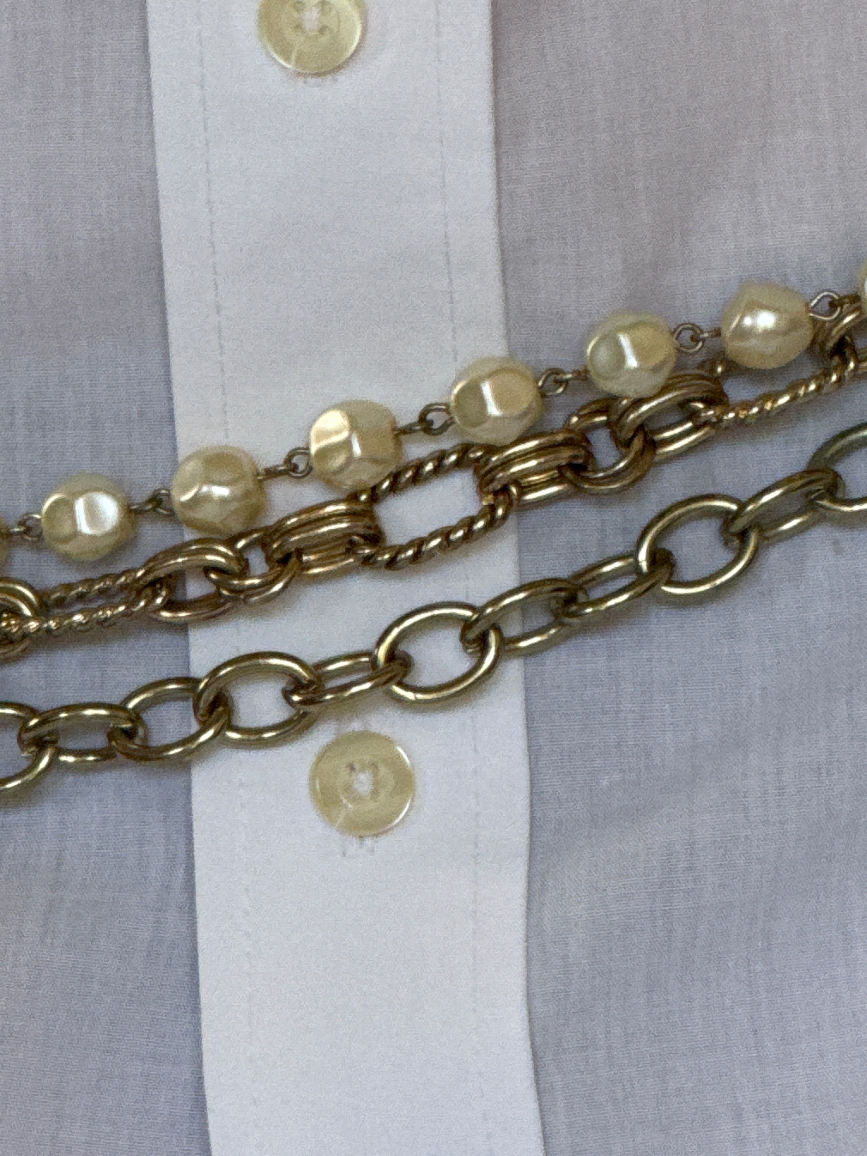 Vintage faux pearl chain belt close-up
