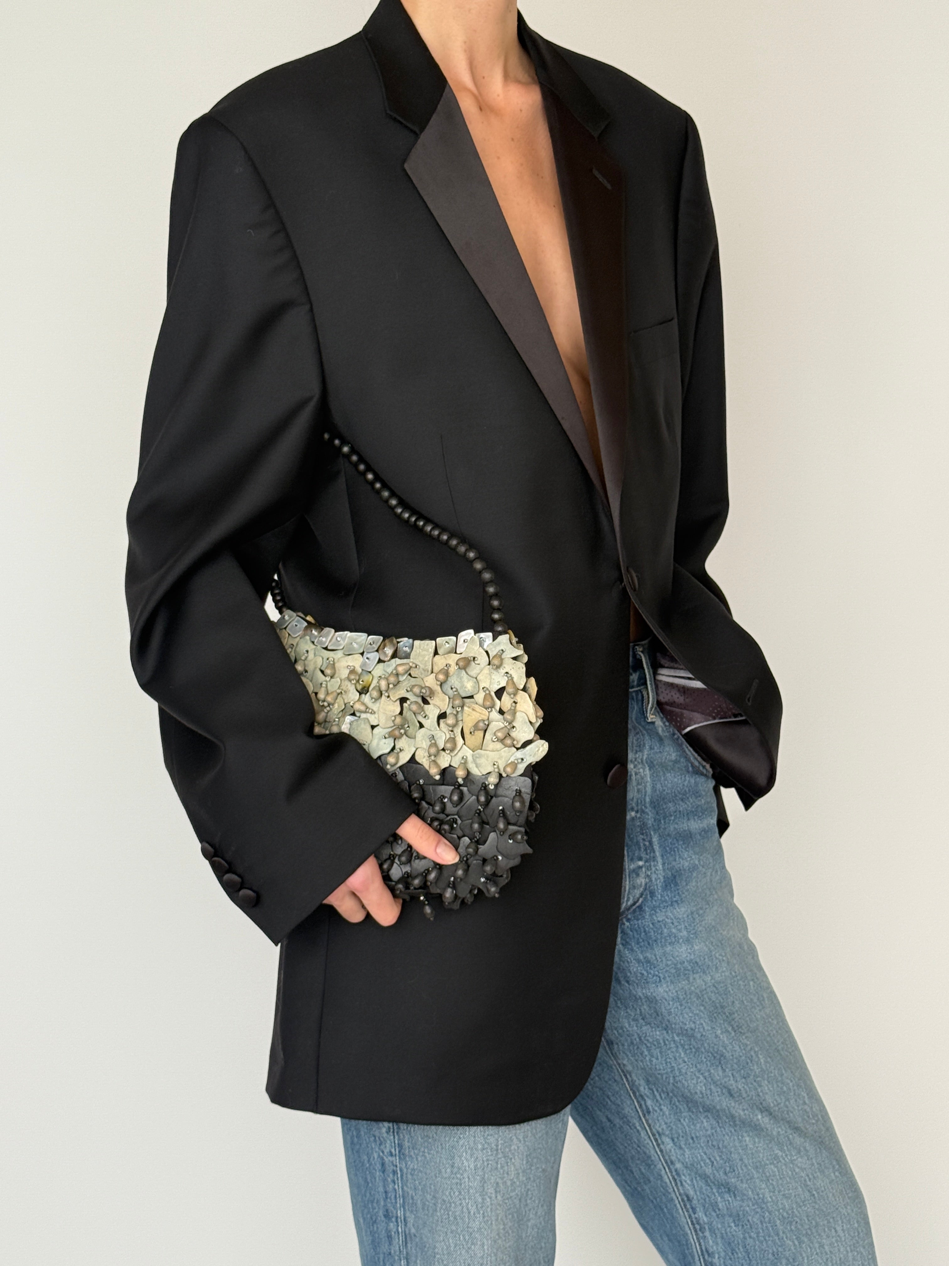 Vintage black blazer pocket and cuff detail