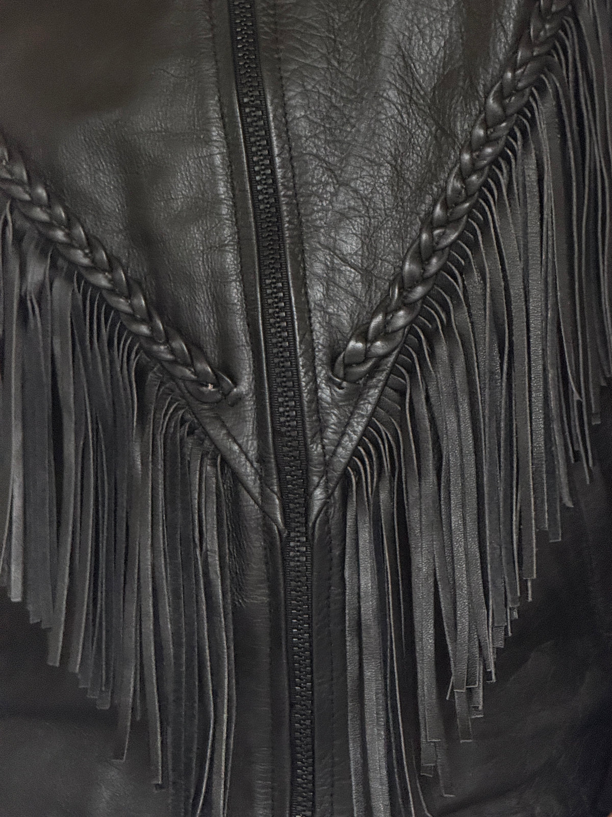Vintage black motorcycle leather jacket cascading fringe detail