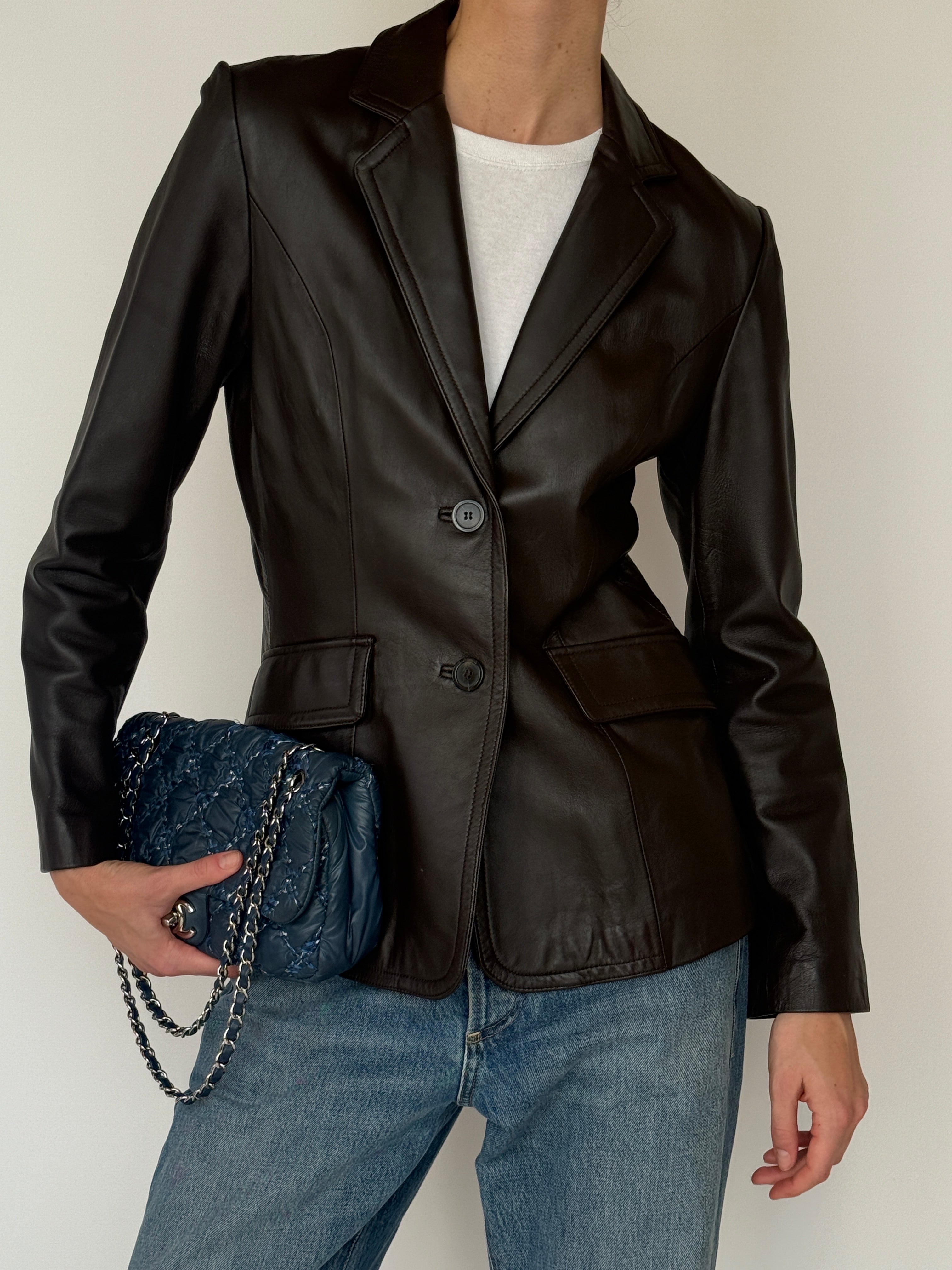 Vintage dark brown leather blazer leather texture close-up