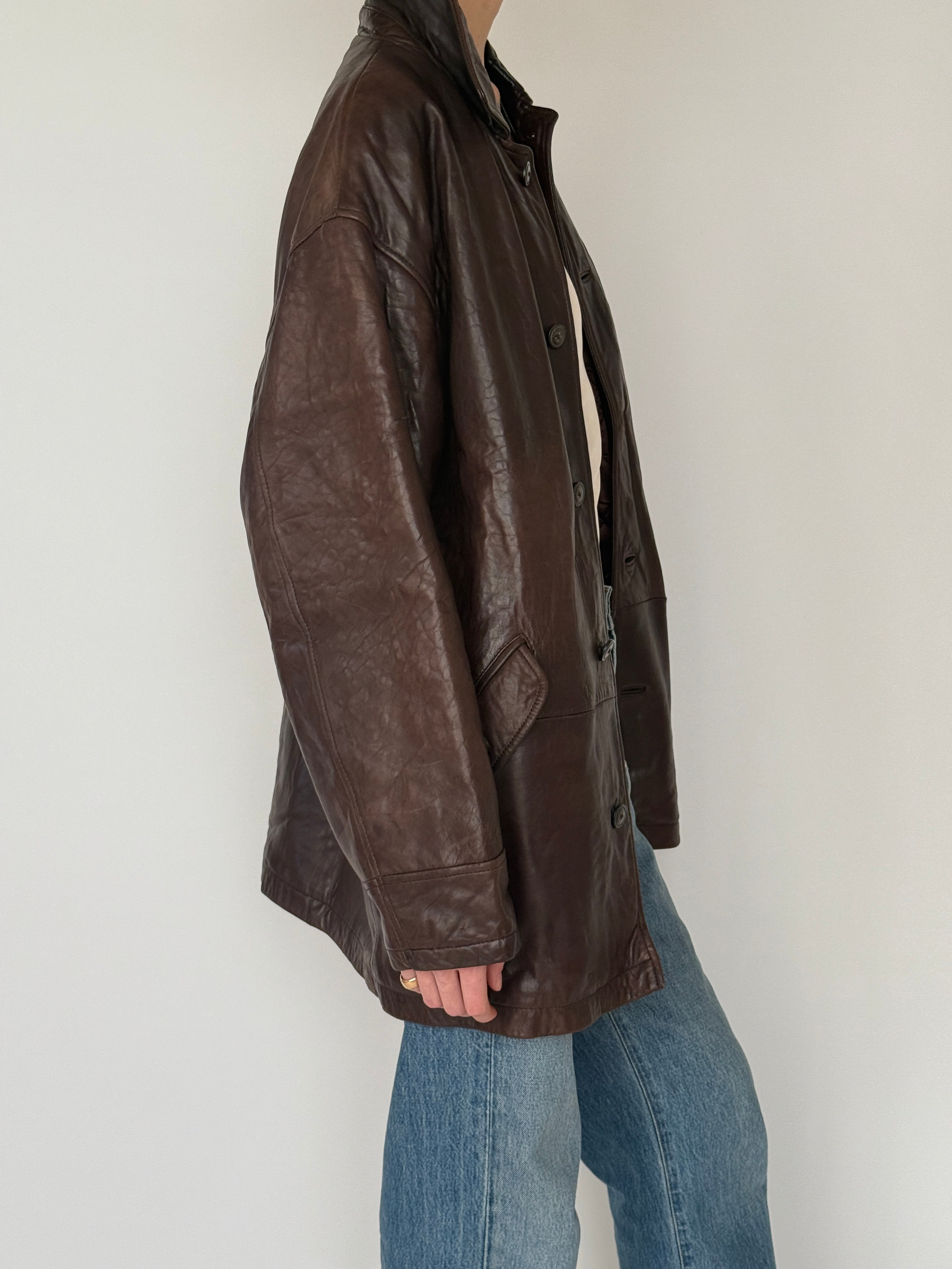 Vintage brown leather jacket sleeve detail