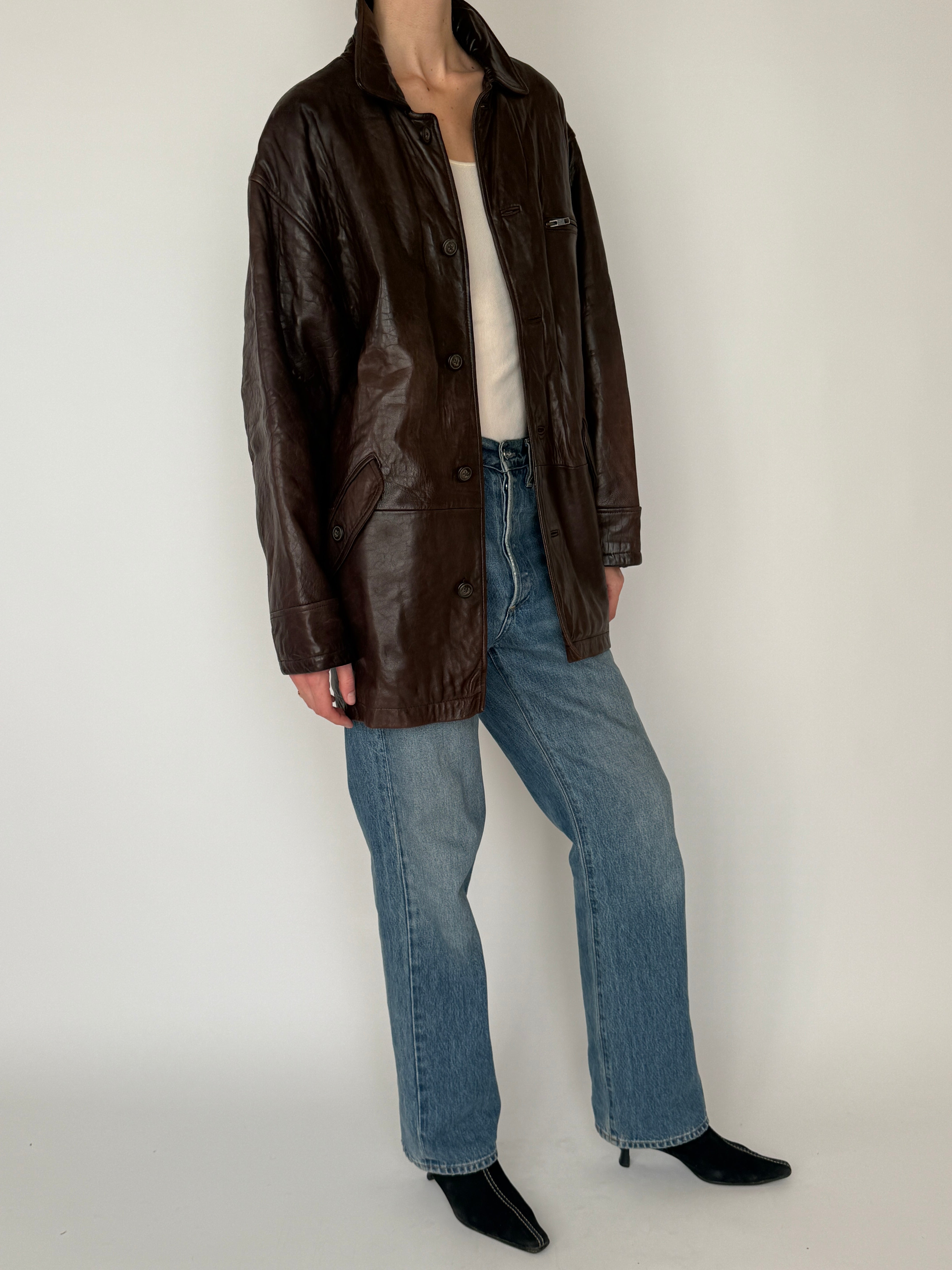 Vintage brown leather jacket full body view