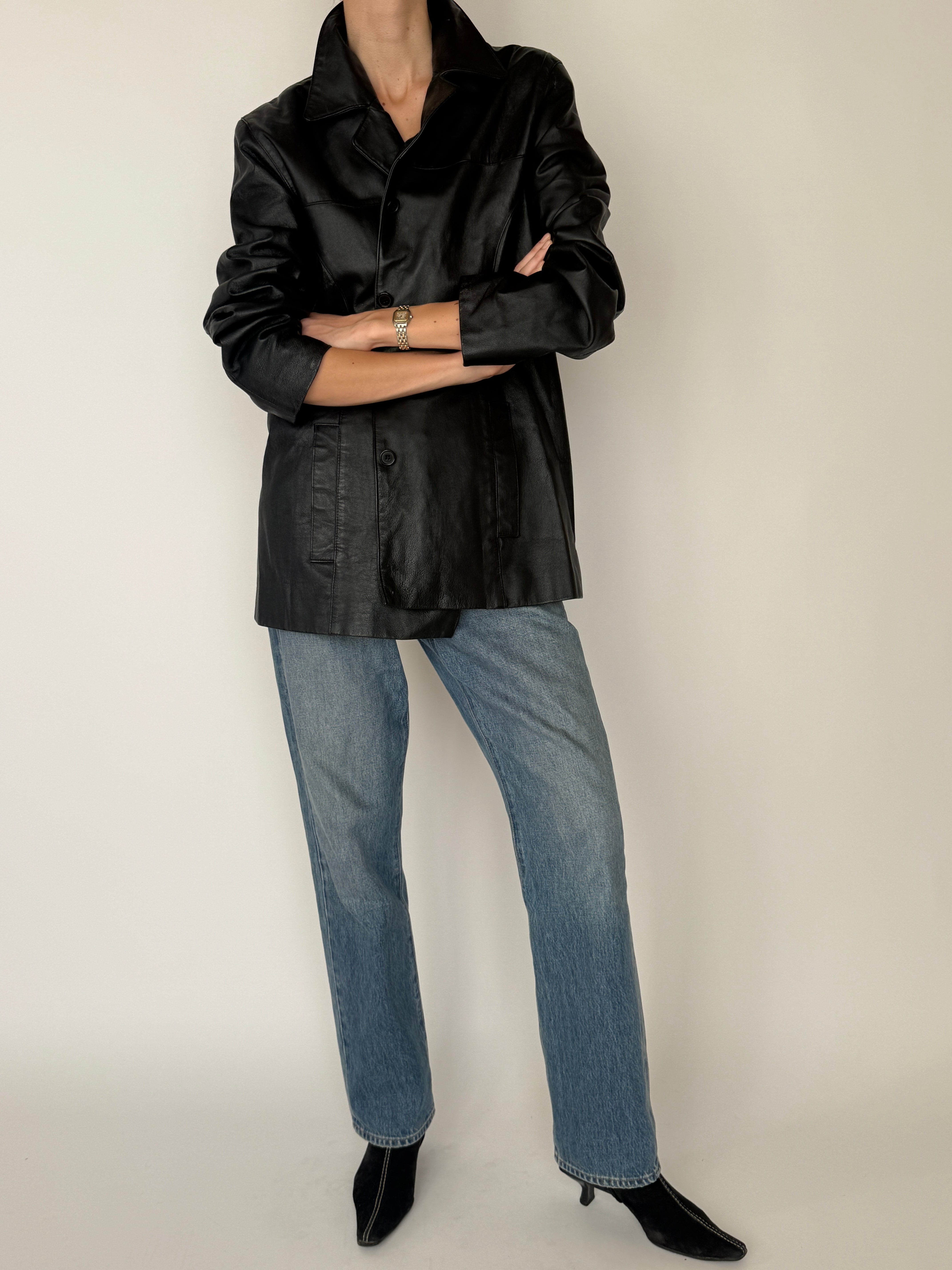 Vintage black leather jacket side view mid-length leather jacket