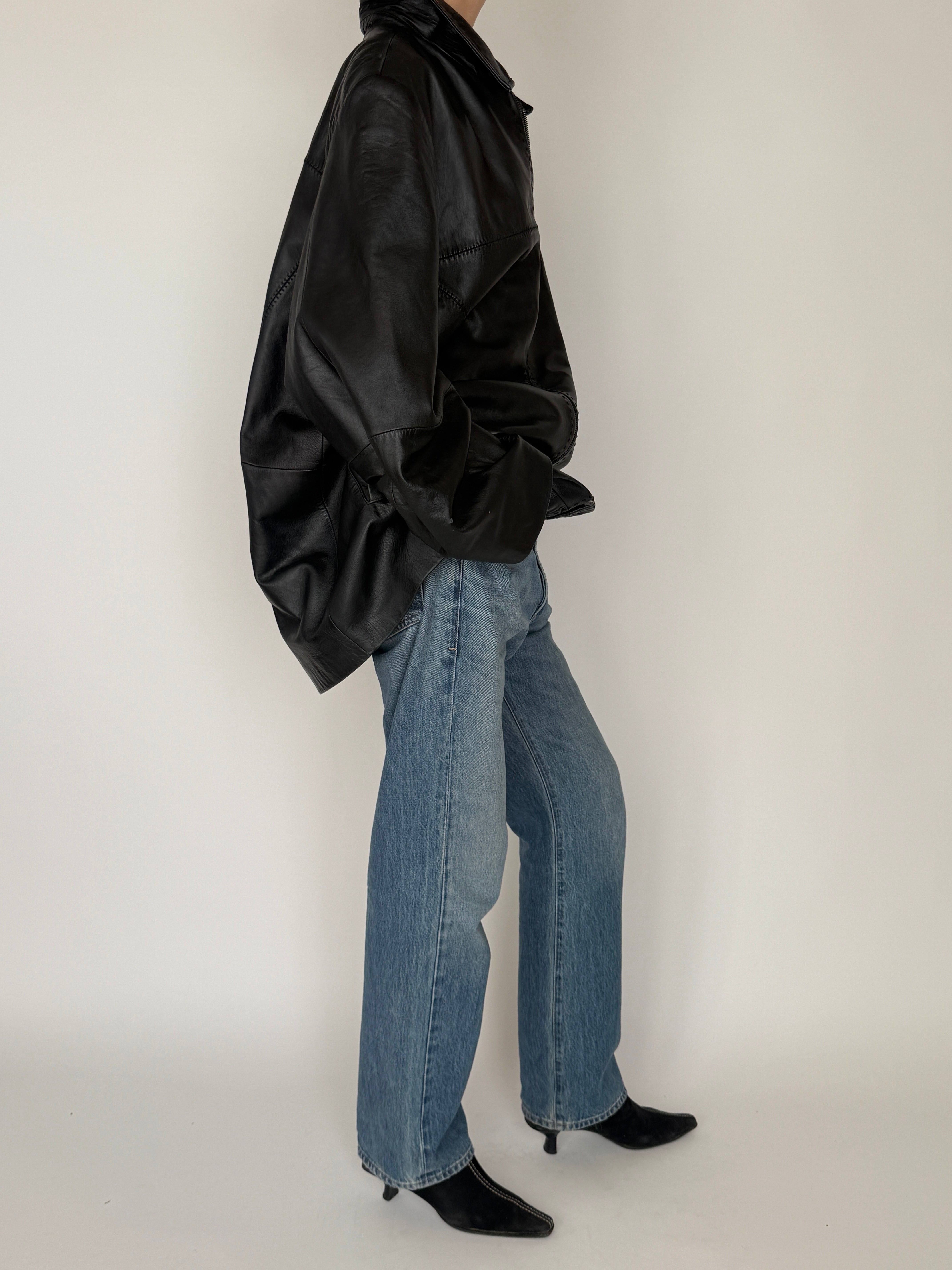 Vintage black oversized leather zip jacket side view