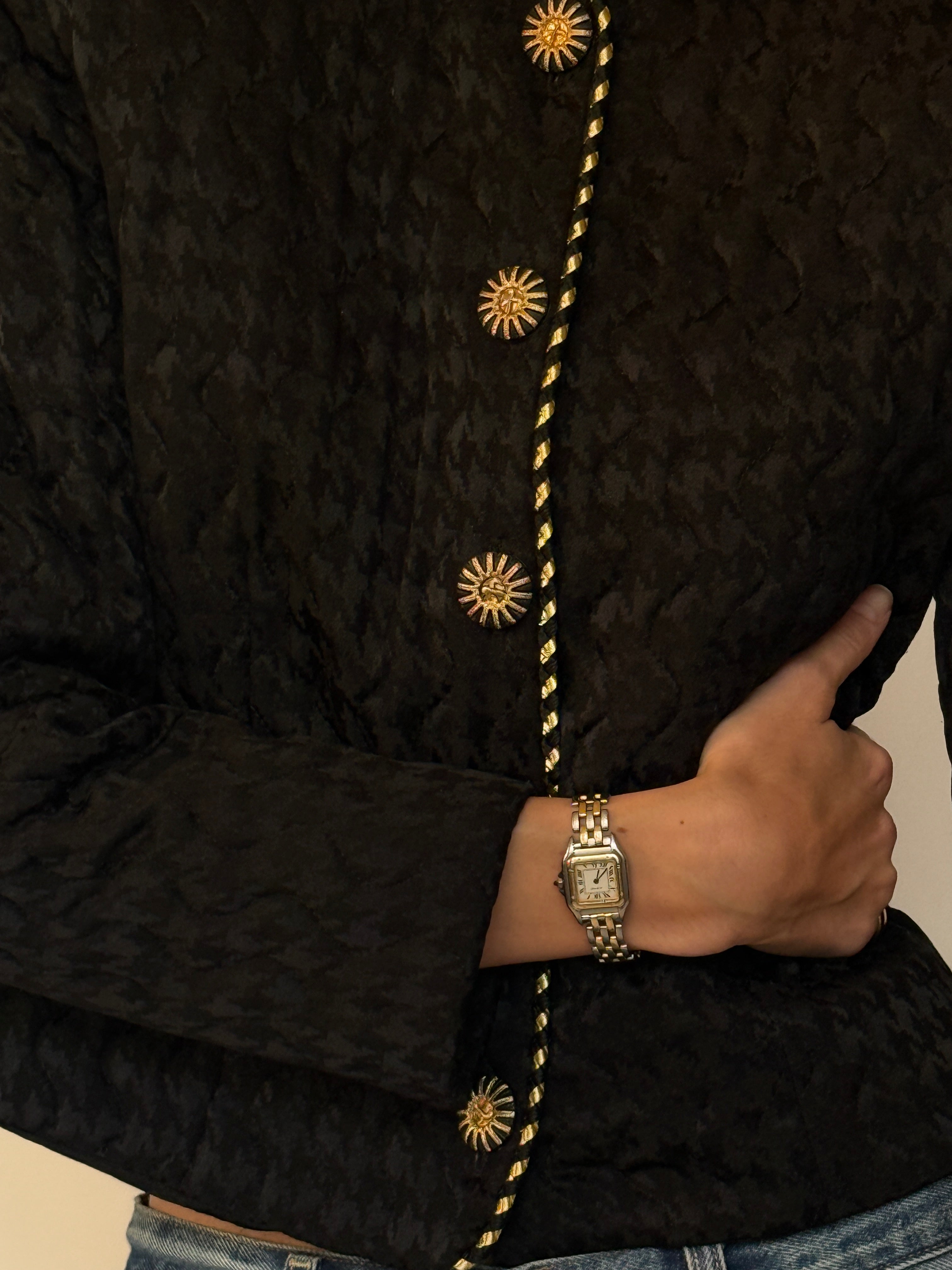 Vintage black houndstooth textured silk fabric close-up