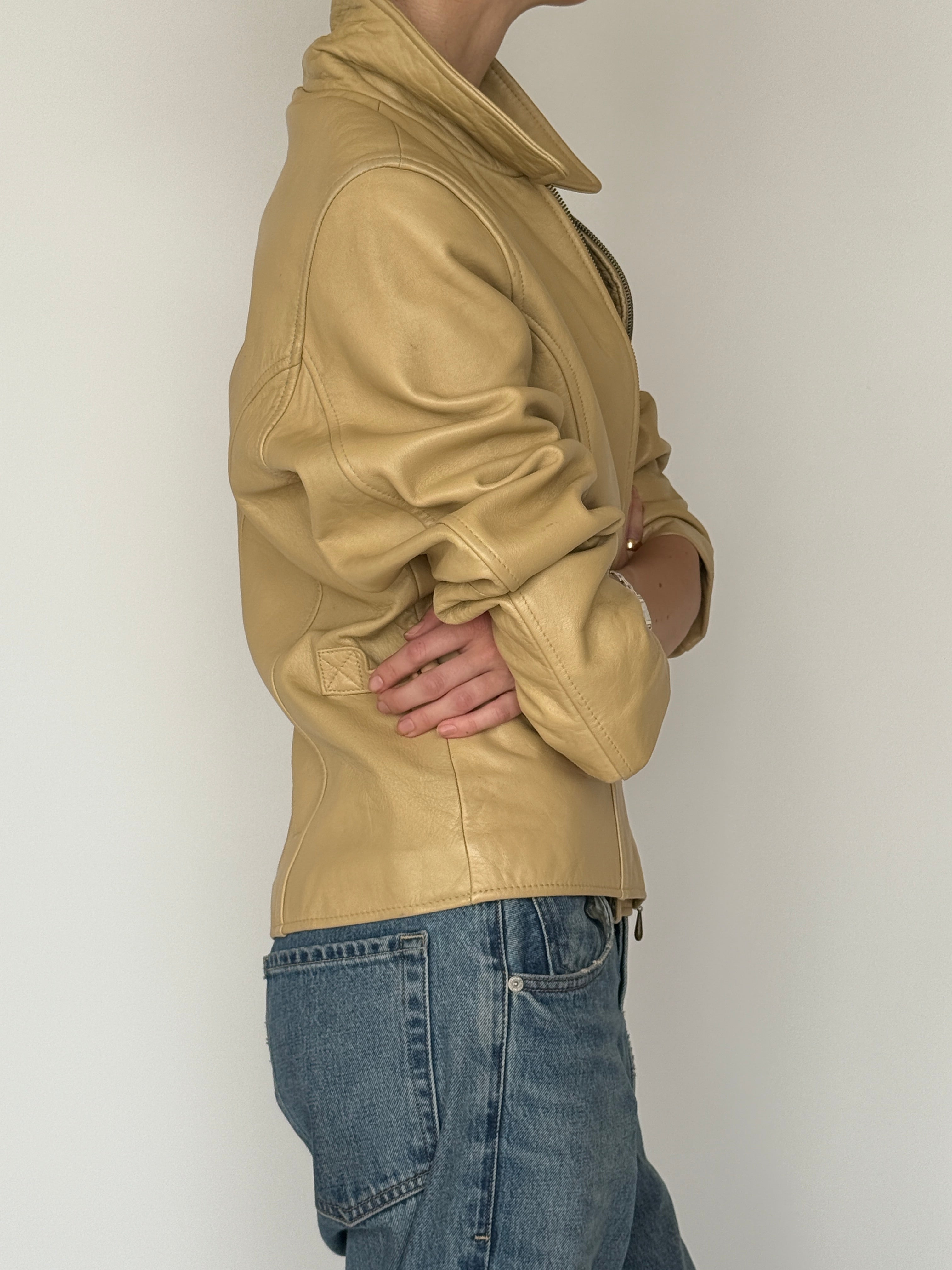 Vintage beige leather jacket side view