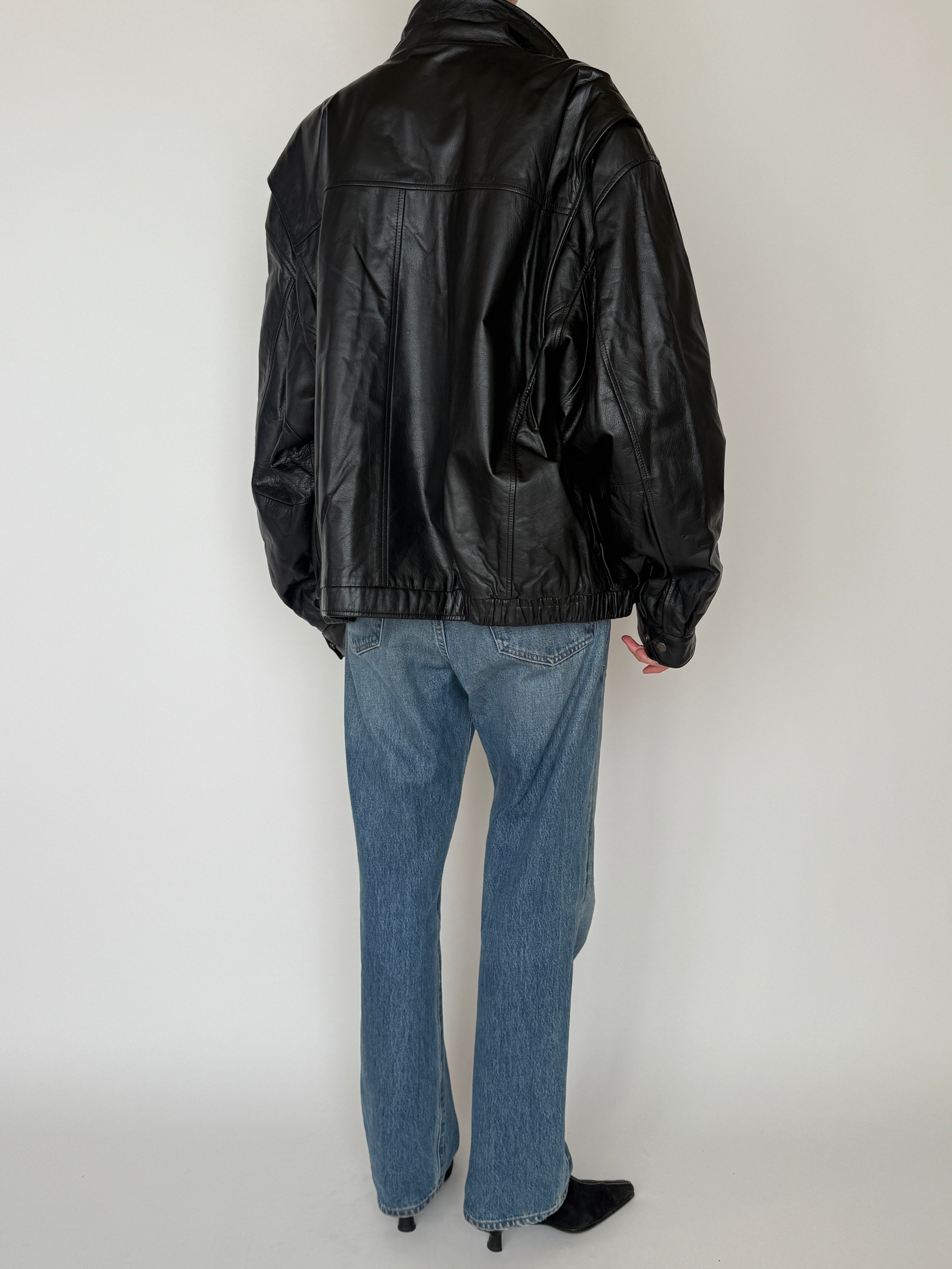 Vintage black leather jacket back view