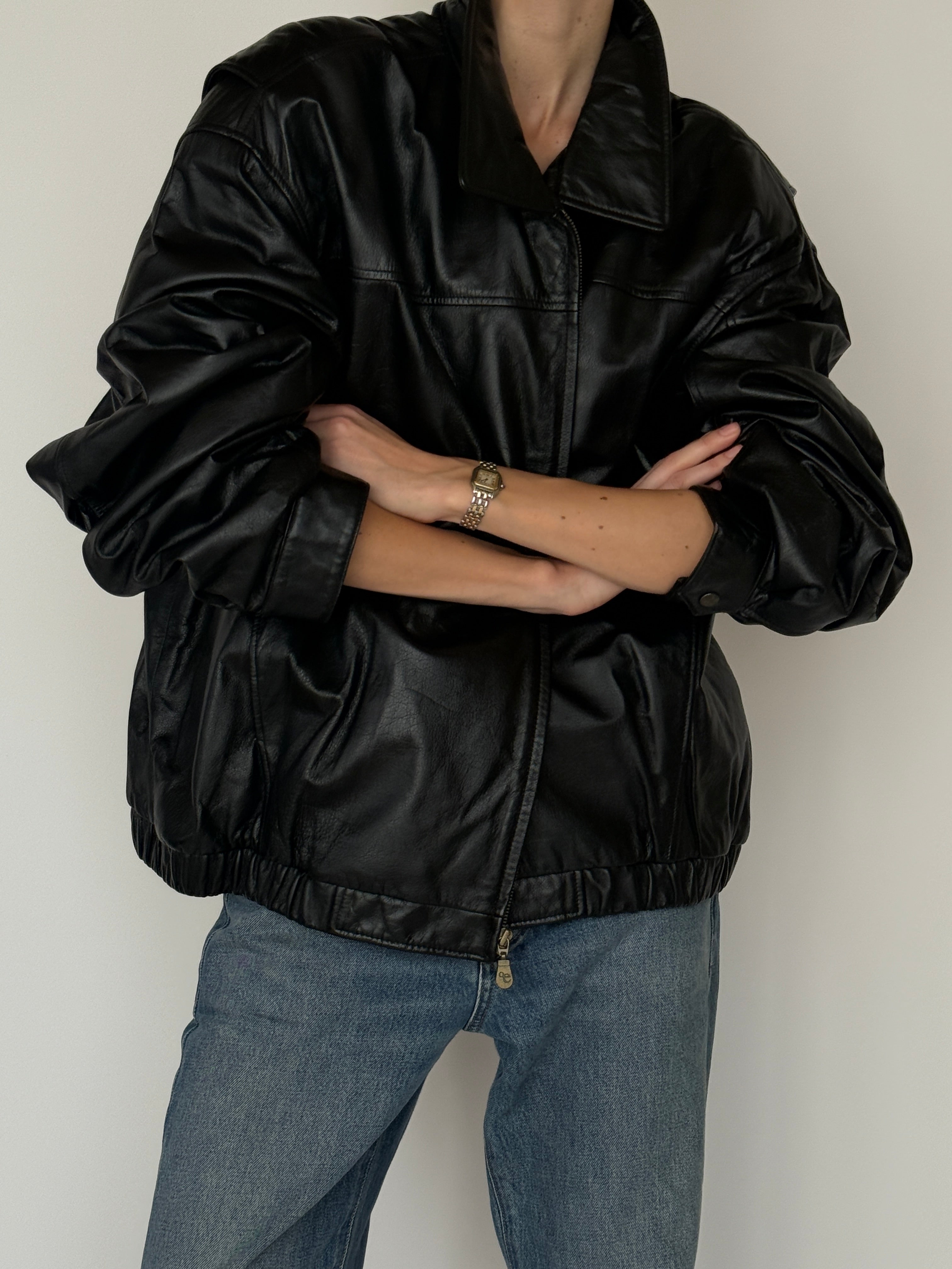 Vintage black leather jacket front view