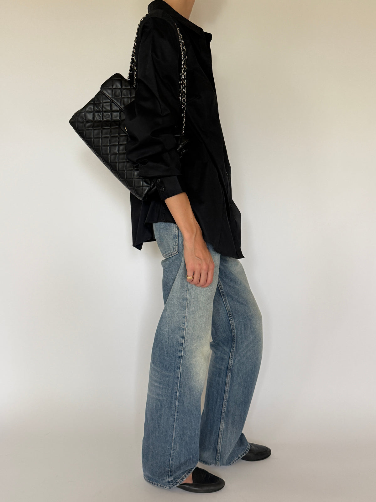 Vintage black oversized button-up shirt side view