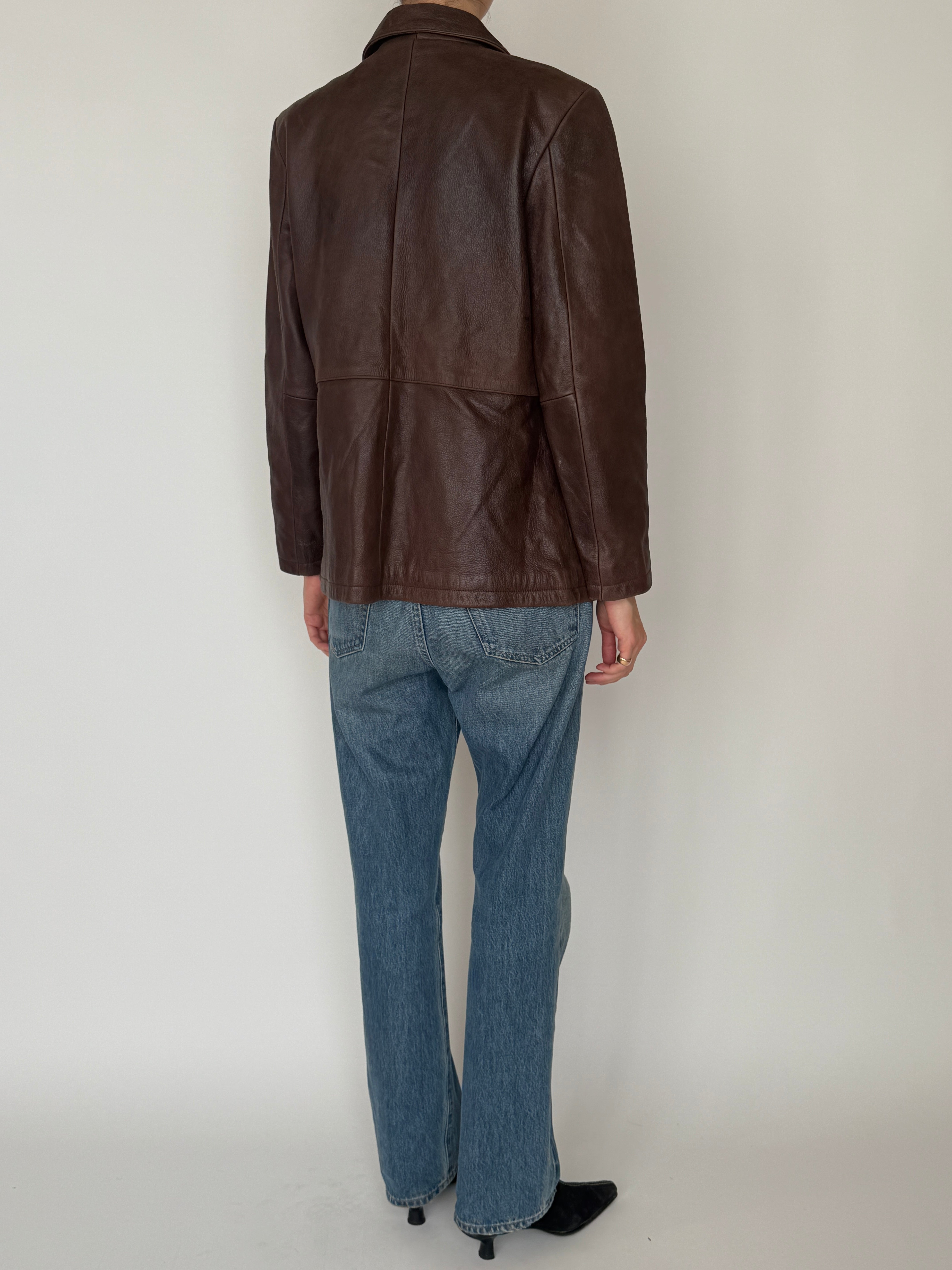 Vintage brown leather jacket back view