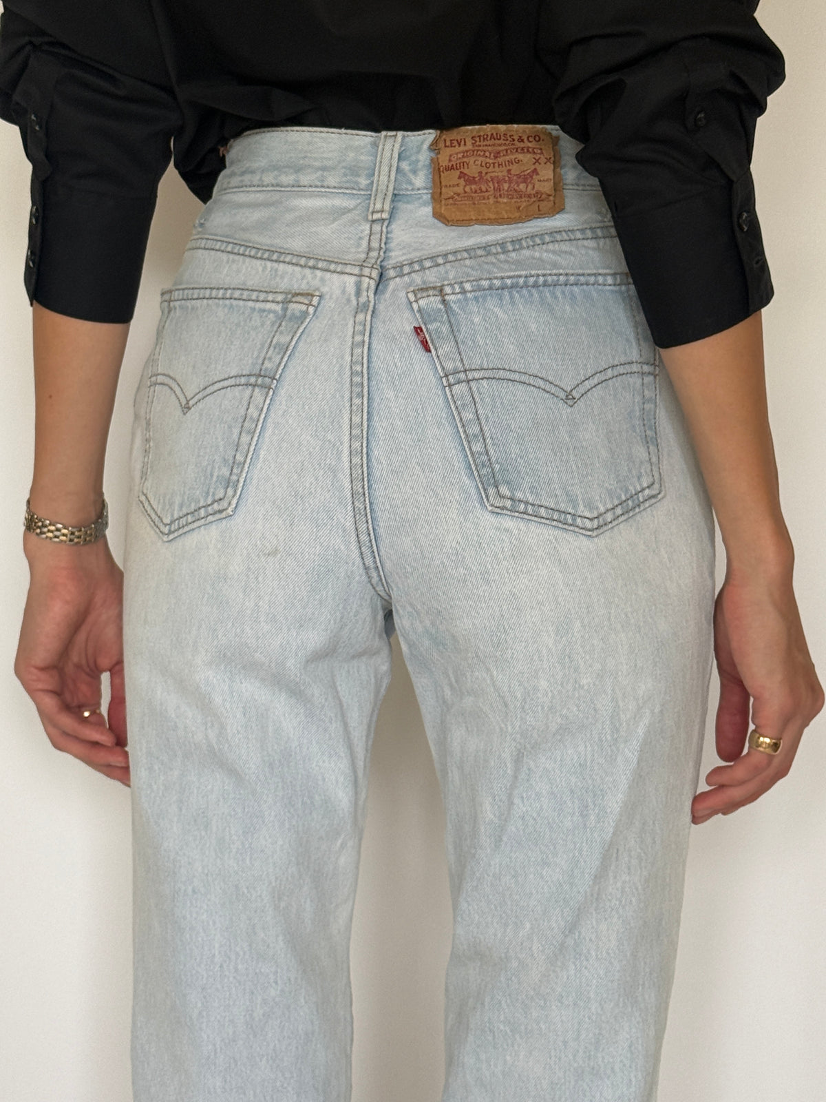 Vintage Levi’s high-rise light blue jeans back view