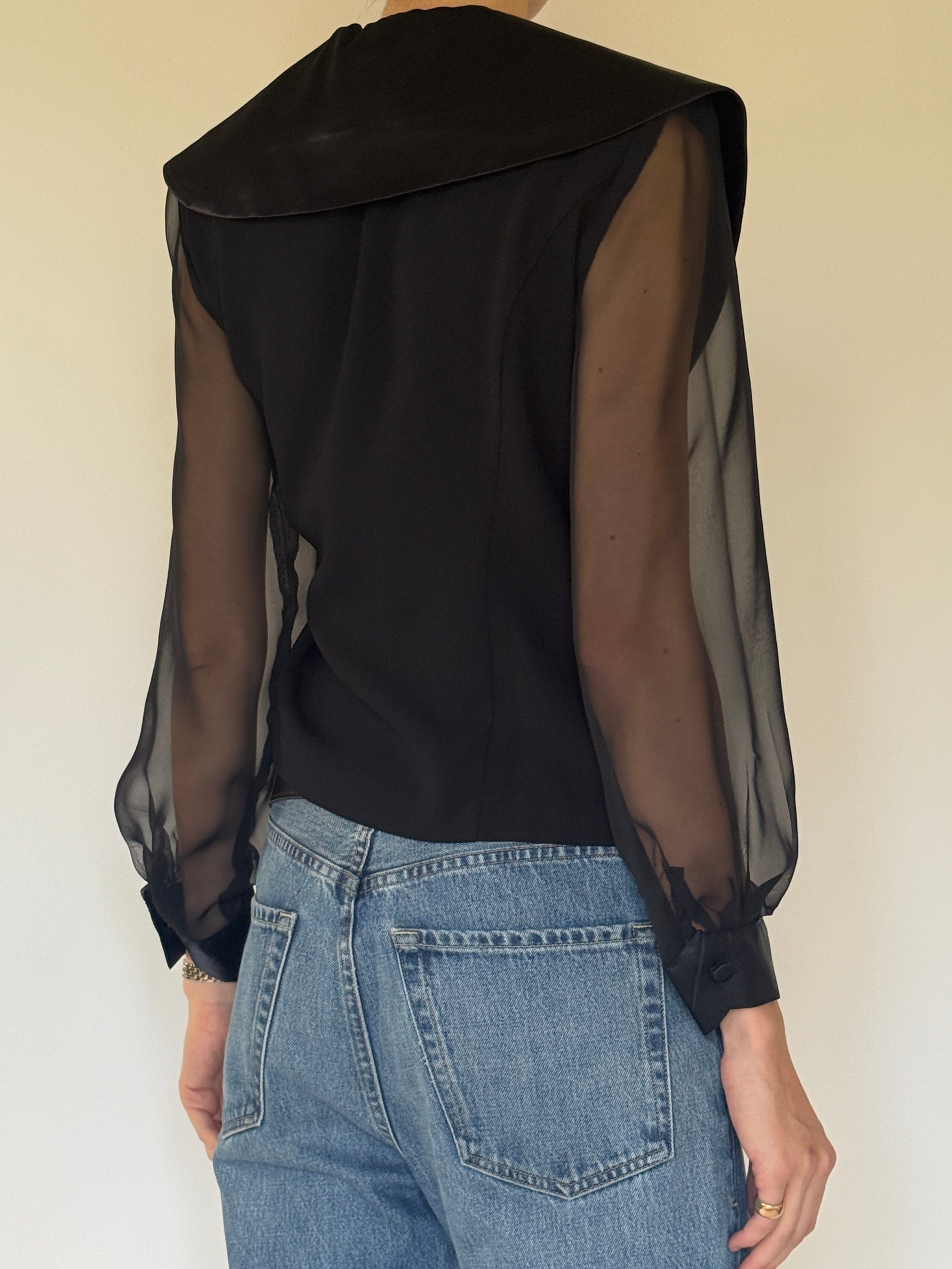 Vintage black wrap blouse back view with sheer long sleeves