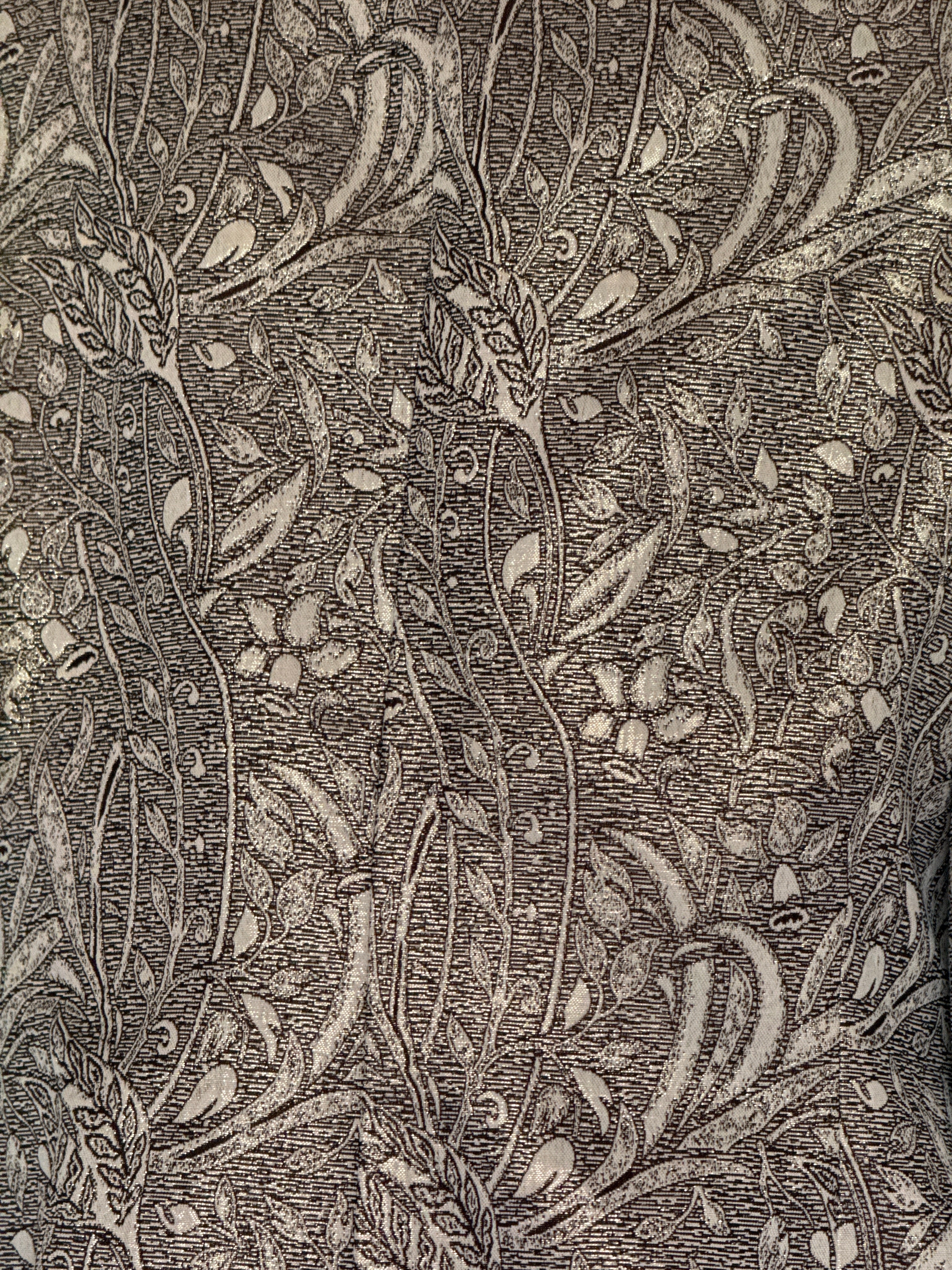 Vintage ivory and brown botanical jacquard fabric close-up