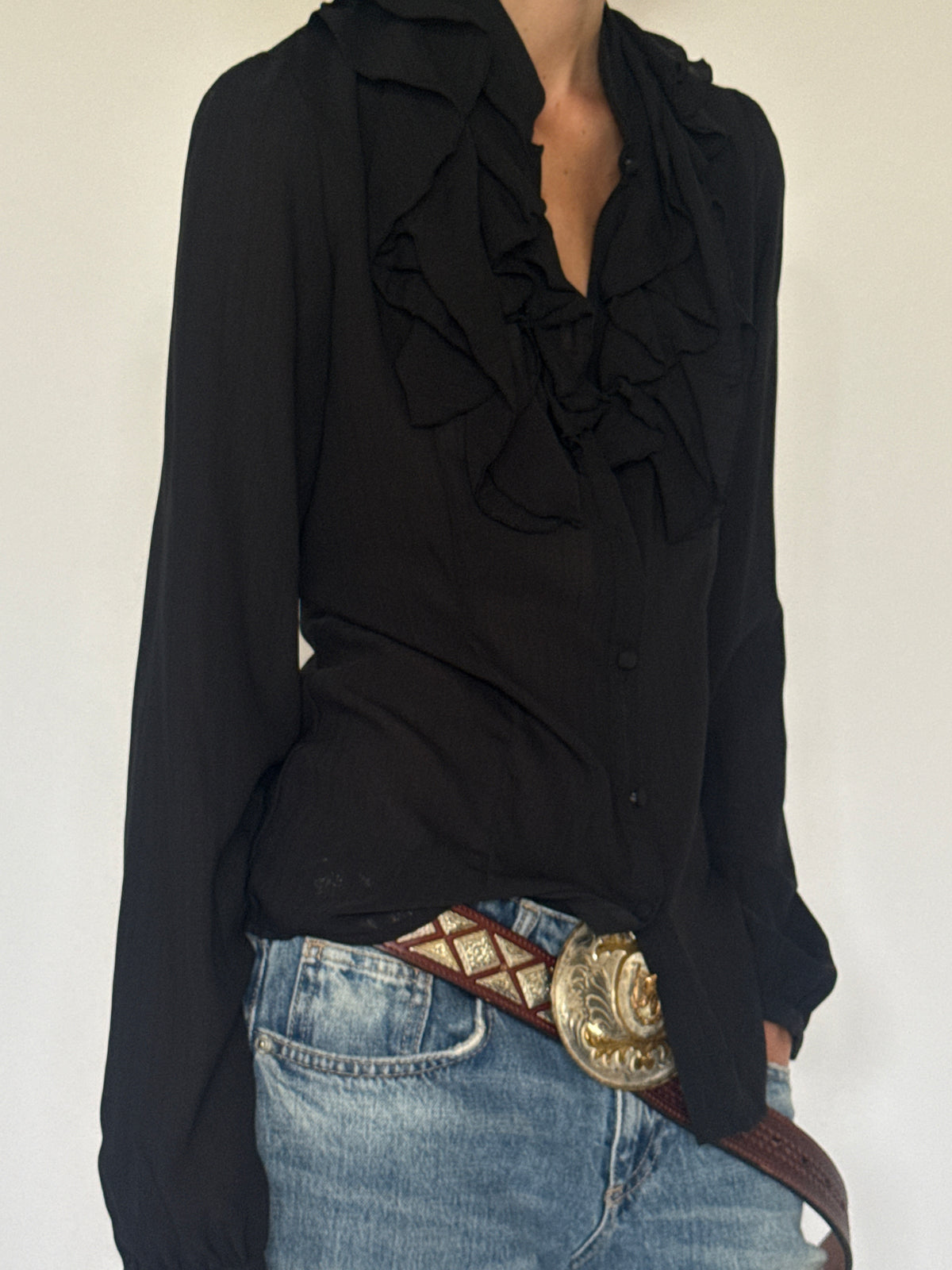 Vintage lightweight black ruffle blouse side view