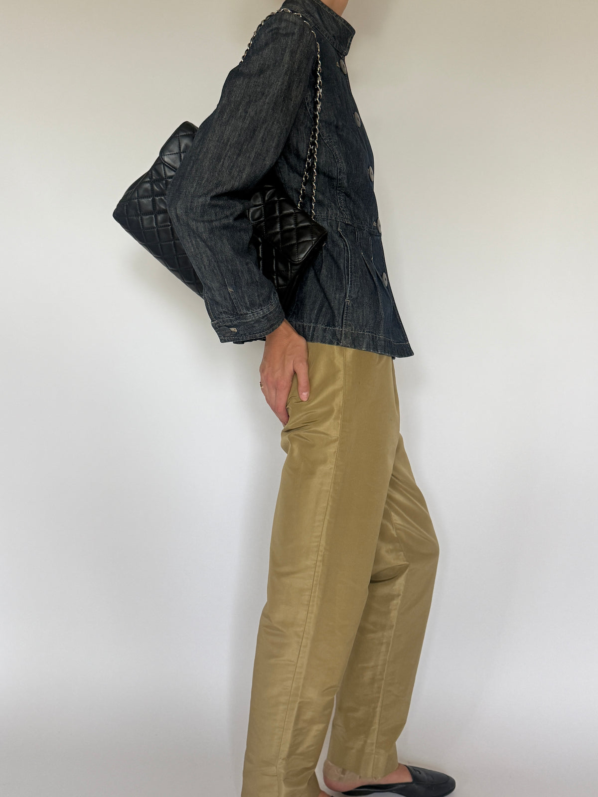 Vintage blue sculpted denim jacket side view