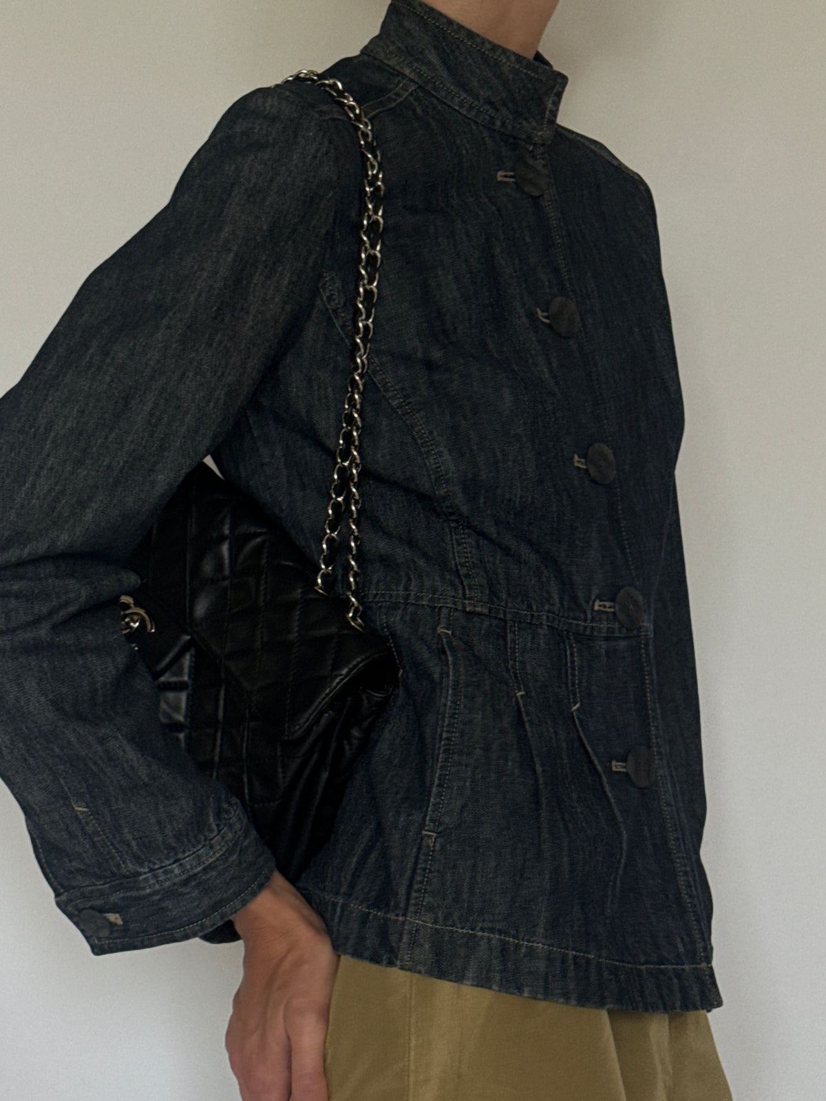 Vintage blue sculpted denim jacket side view