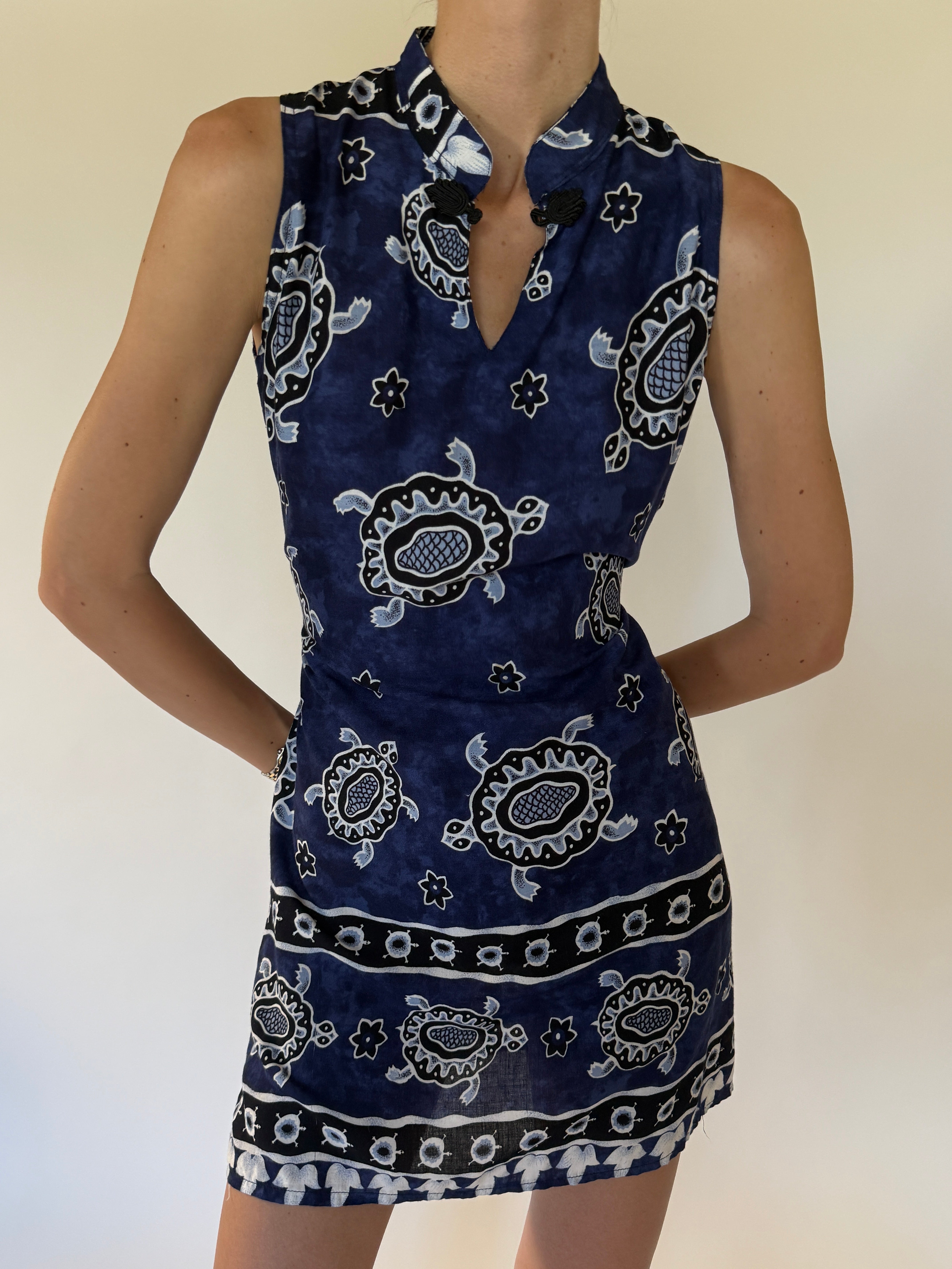 Vintage navy blue turtle-print mini dress front view