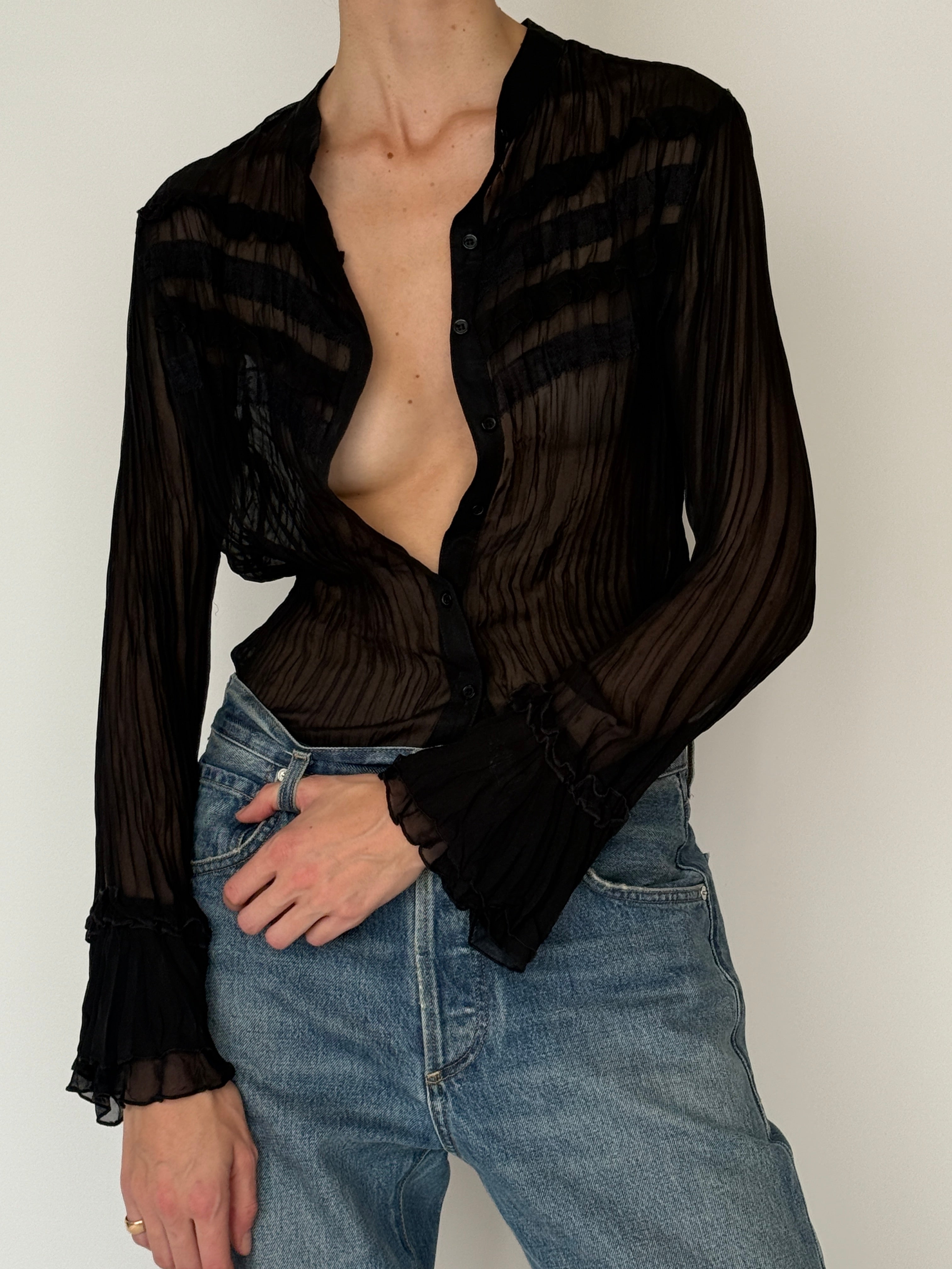 Vintage pleated blouse black fabric close up