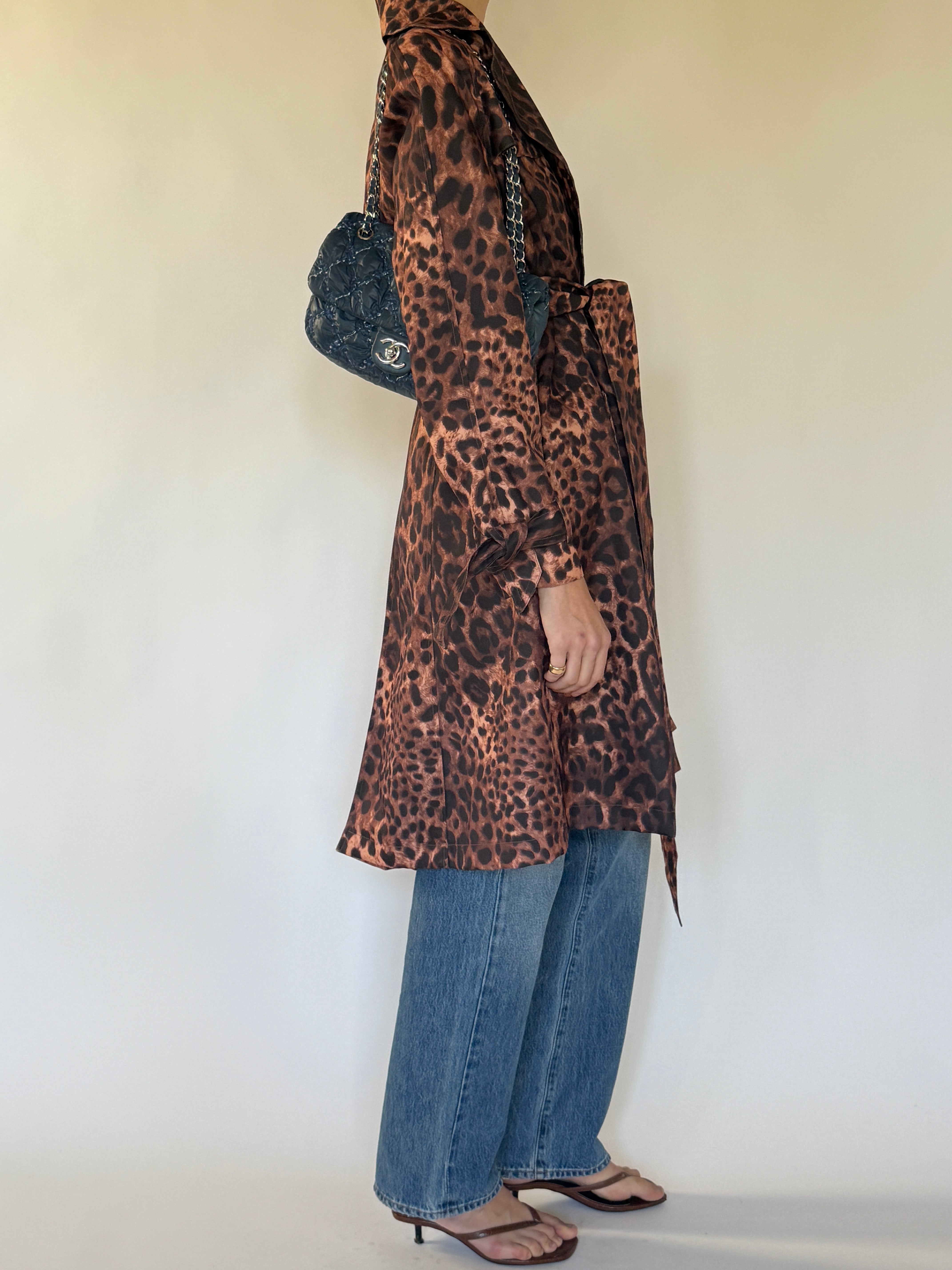 Vintage leopard print trench coat brown side view belted silhouette