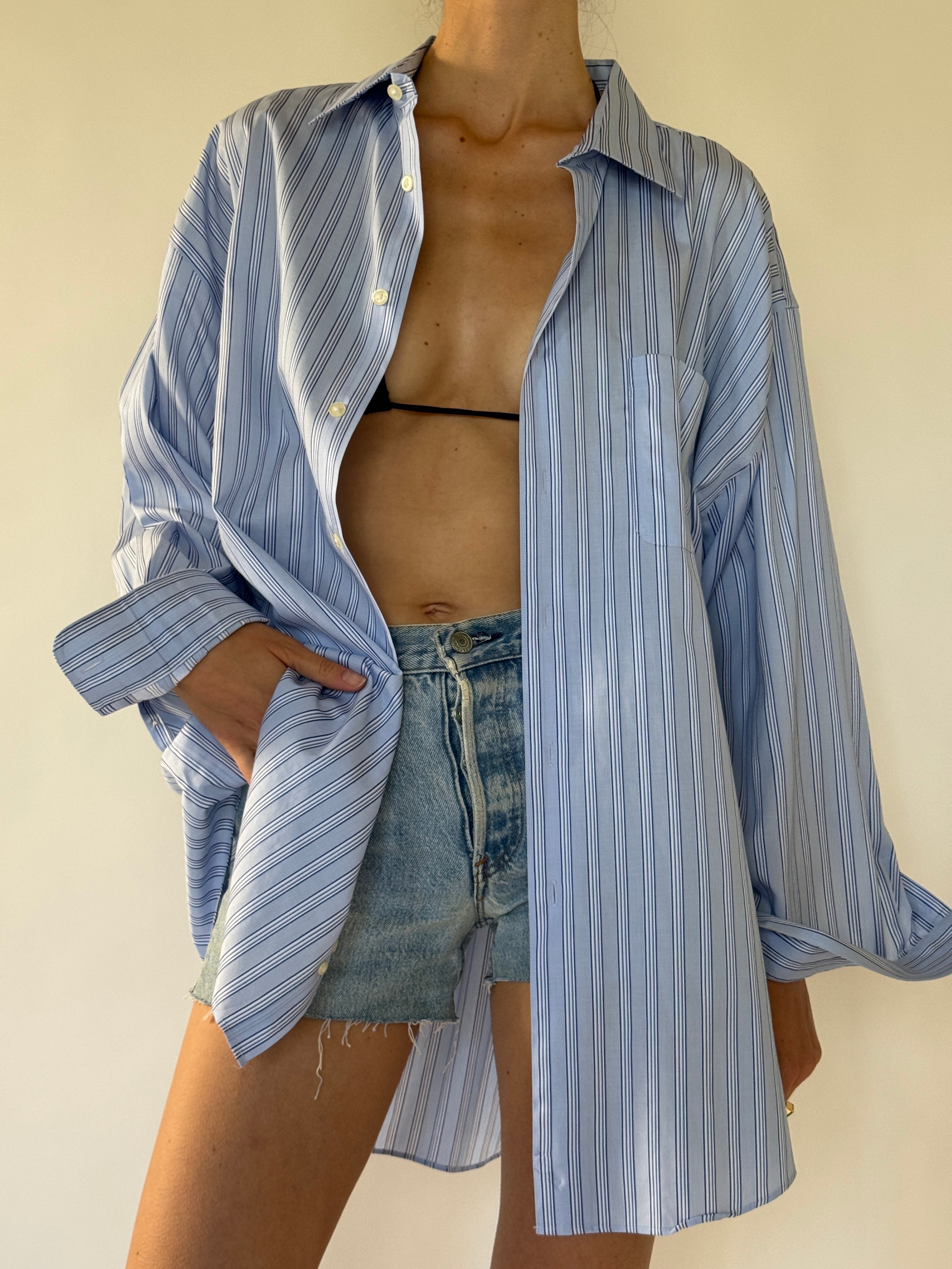 Vintage oversized blue striped button-up shirt front view