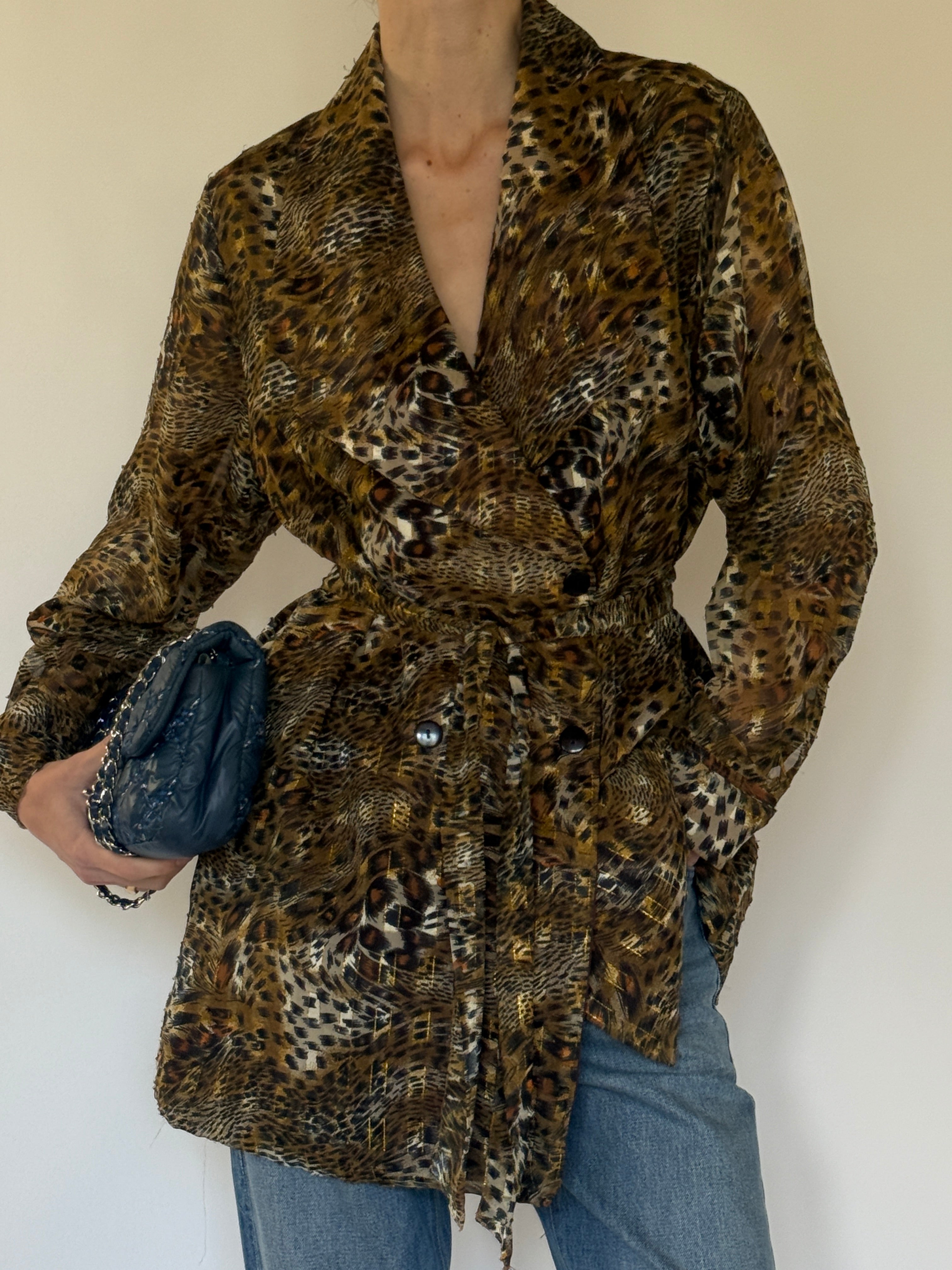 Vintage animal print jacket close-up of lapel and front button detail