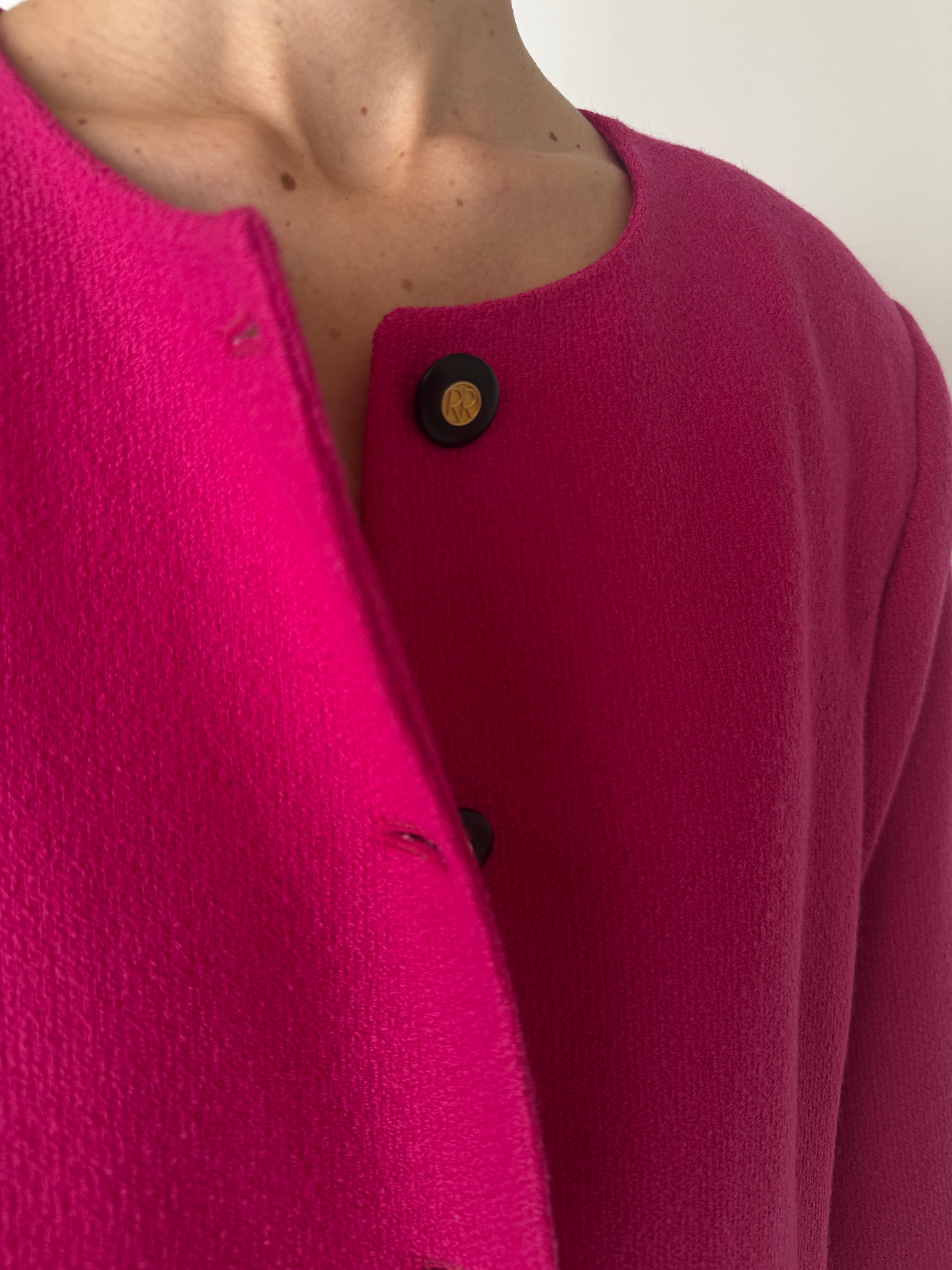 Vintage pink collarless blazer fabric close-up