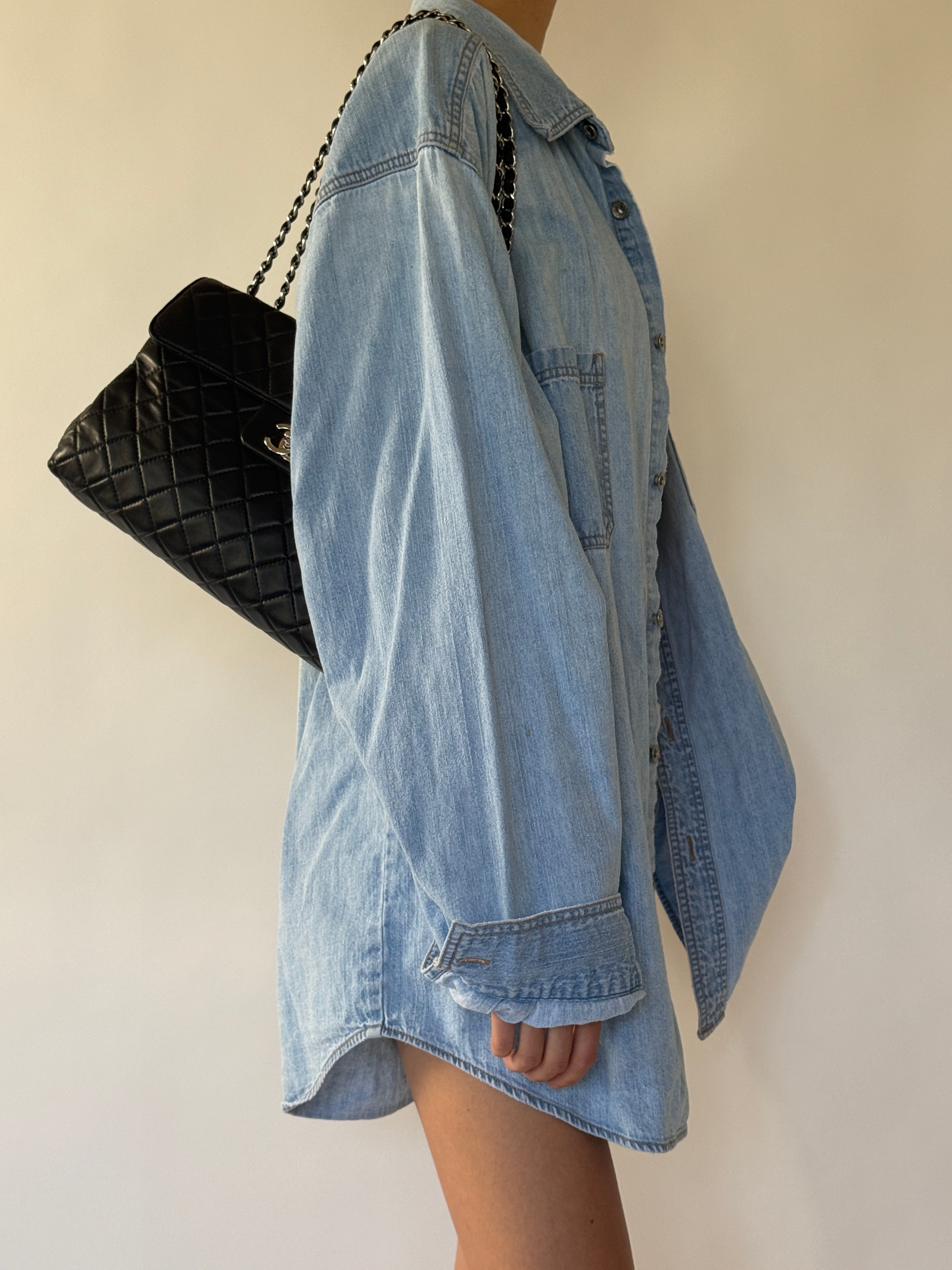 Vintage Levi's light wash denim shirt side view