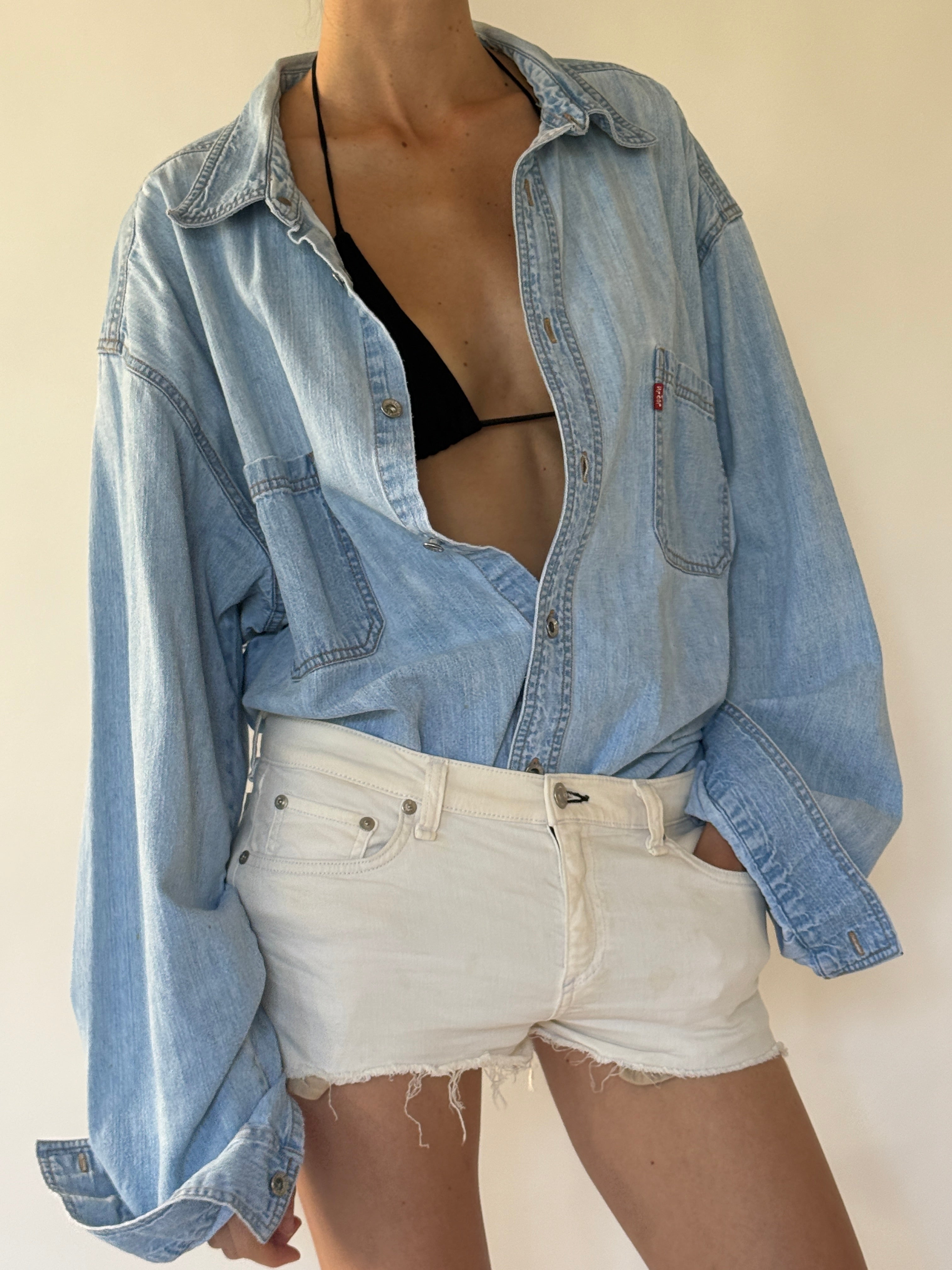 Vintage Levi's light wash denim shirt side view